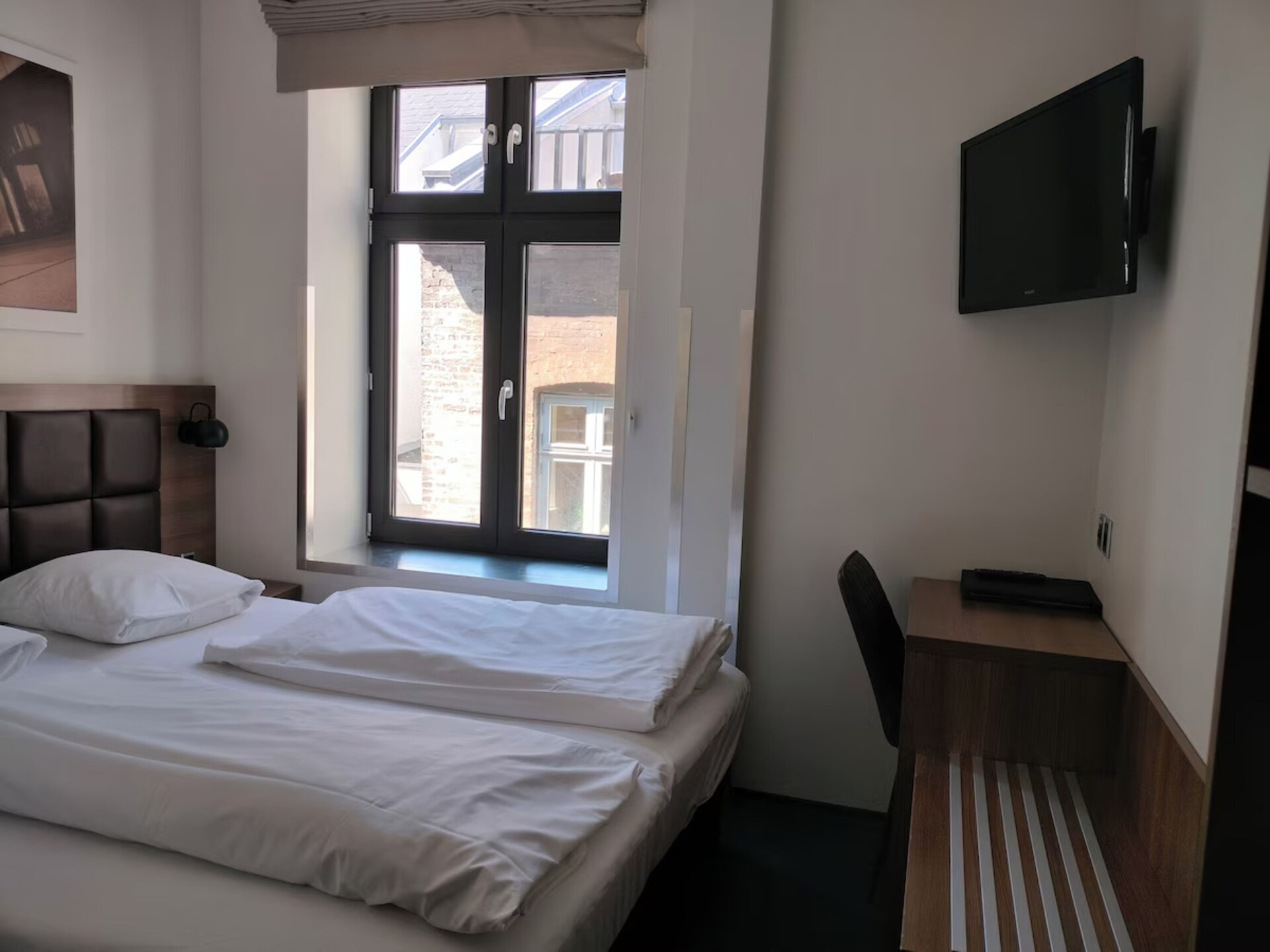 Knusse hotelkamer in het bruisende hart van Aalborg, direct aan Jomfru Ane Gade - foto 11