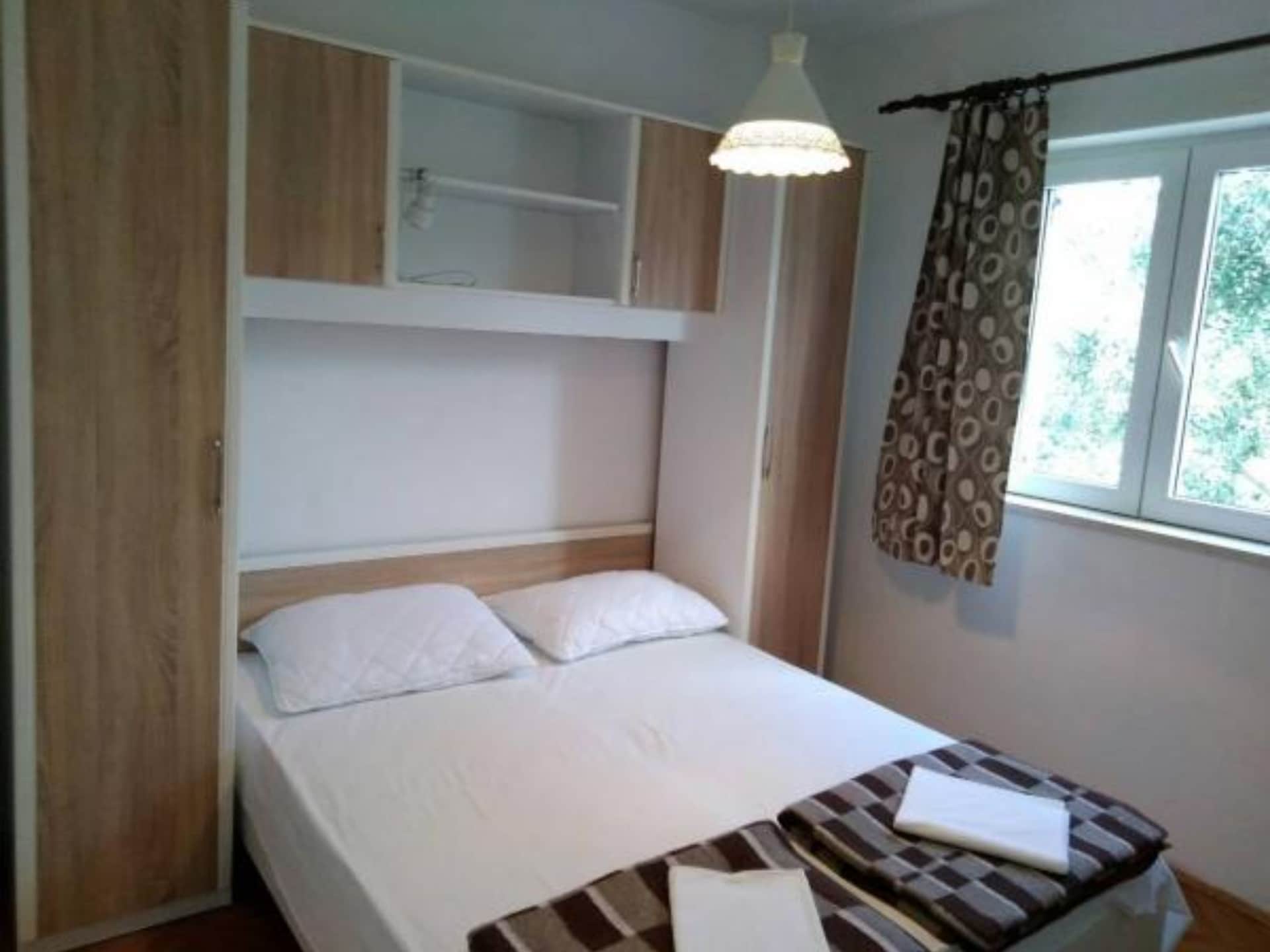 Zonovergoten appartement met terras vlakbij strand Banjol - foto 3
