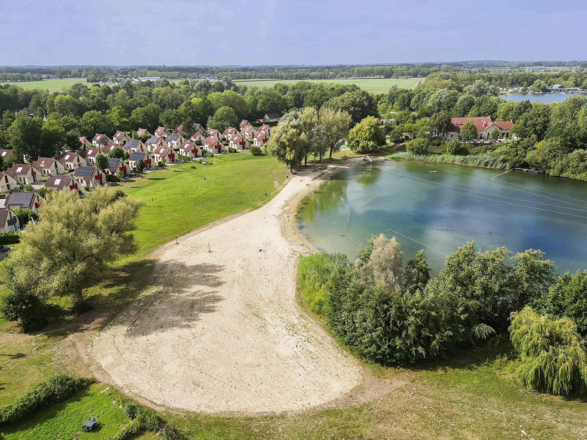 Vrijstaande bungalow De Zingende Wilg aan water in park Ewijk - foto 29