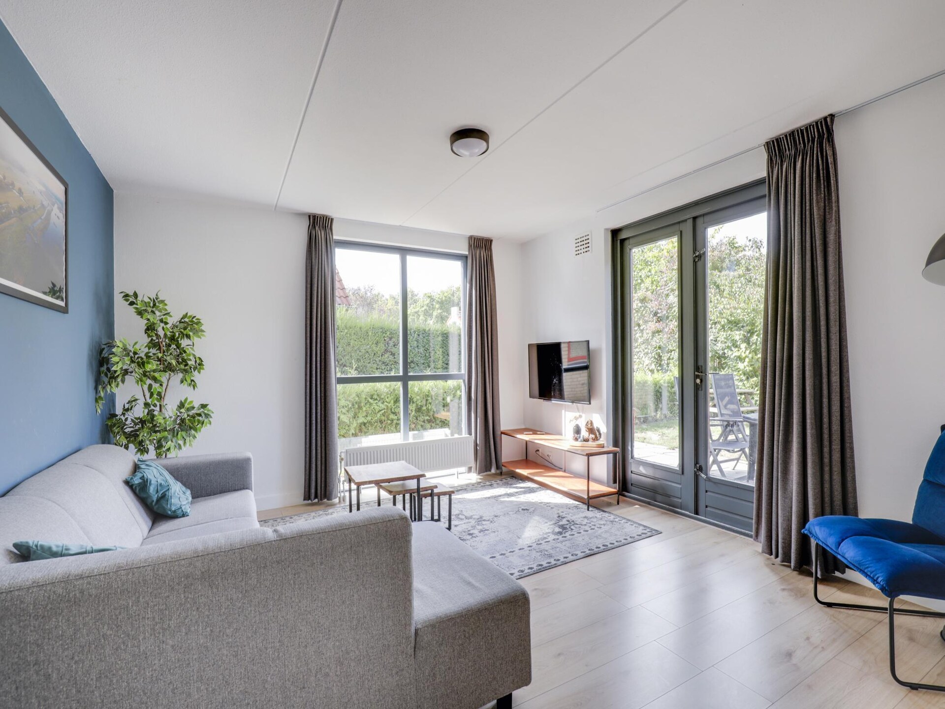 Vrijstaande bungalow De Zingende Wilg aan water in park Ewijk - foto 14