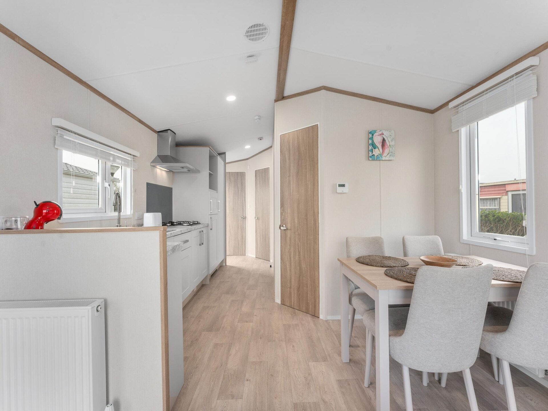 Knus, vrijstaand chalet met airco, nabij strand en duinen van De Haan - foto 9