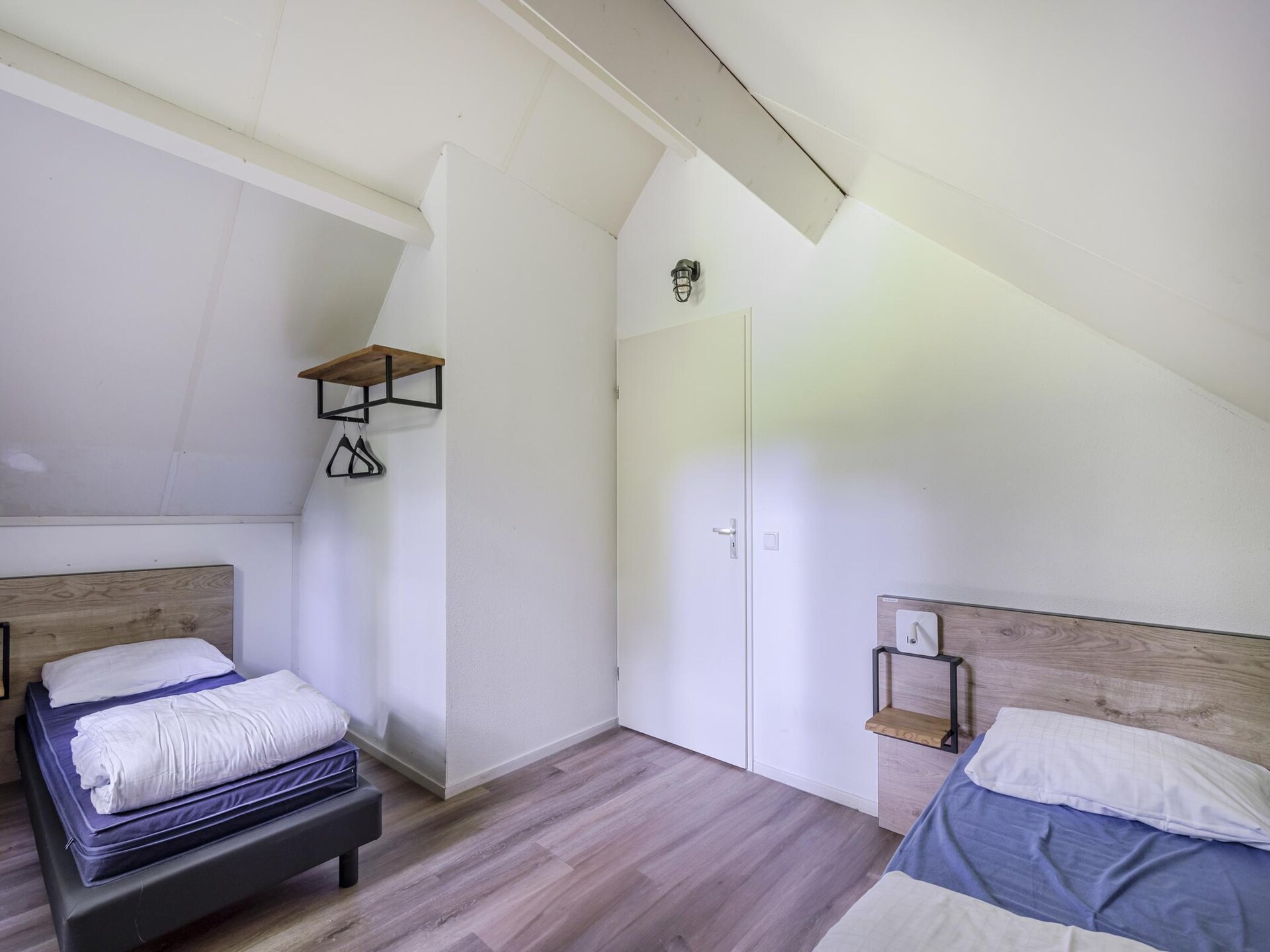 Vrijstaande wellnessbungalow aan het meer in Ewijk voor 4 personen - foto 21