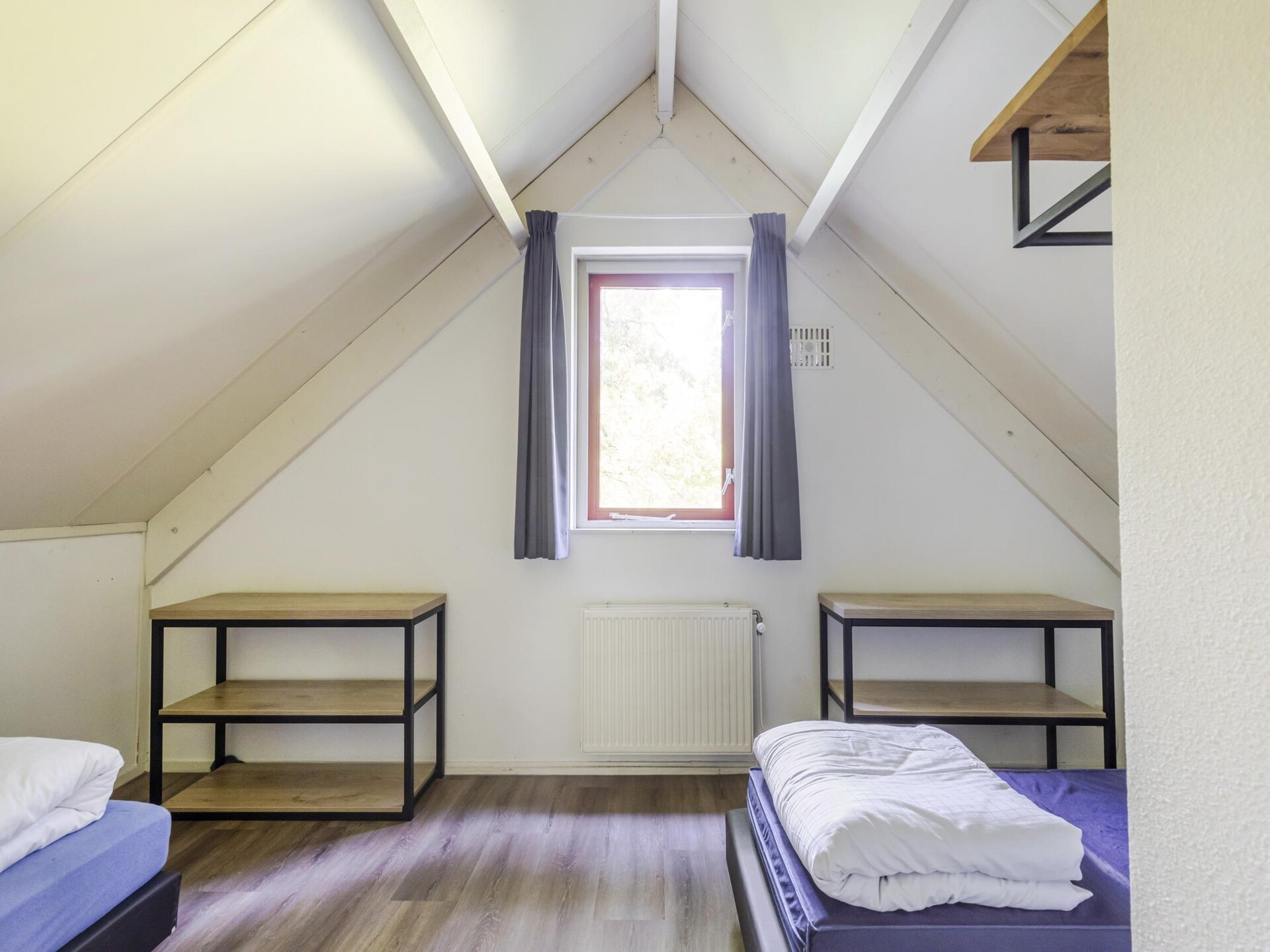 Vrijstaande wellnessbungalow aan het meer in Ewijk voor 4 personen - foto 23