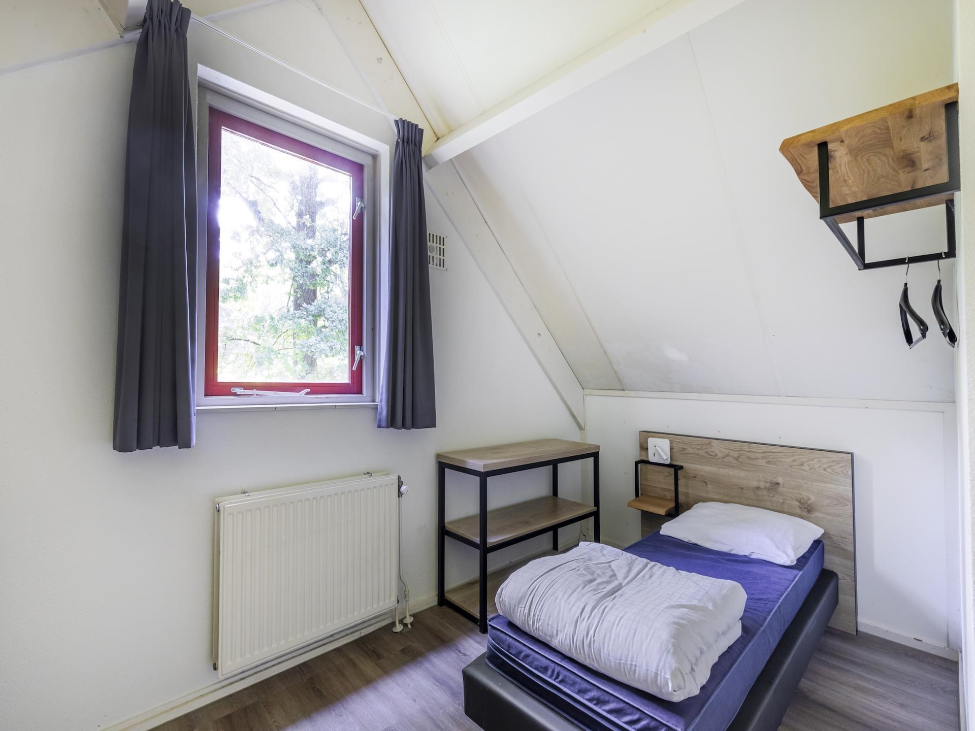 Vrijstaande wellnessbungalow aan het meer in Ewijk voor 4 personen - foto 24