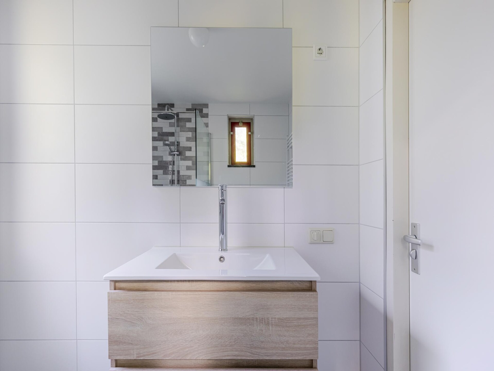 Vrijstaande wellnessbungalow aan het meer in Ewijk voor 4 personen - foto 28