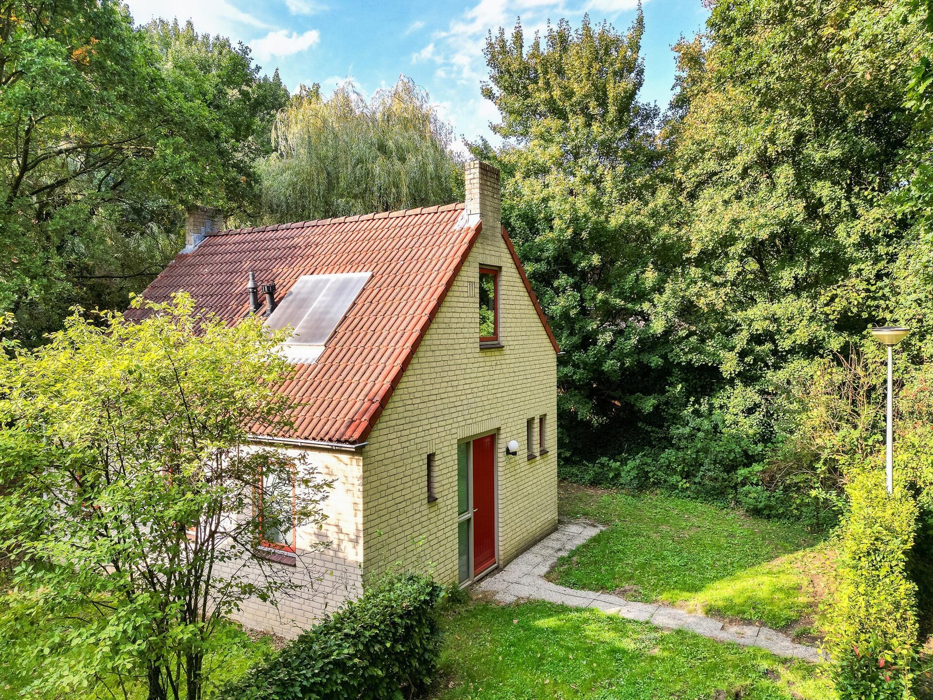 Vrijstaande wellnessbungalow aan het meer in Ewijk voor 4 personen - foto 13