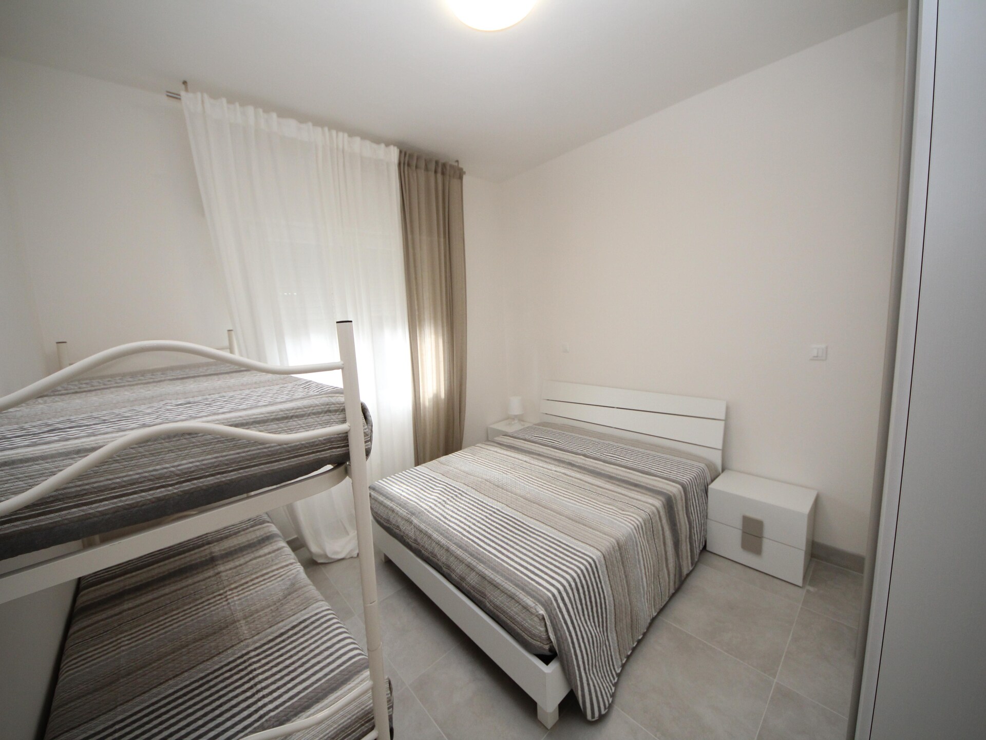 Modern appartement in Rosolina Mare, 400m van strand, met tuin & airco - foto 21