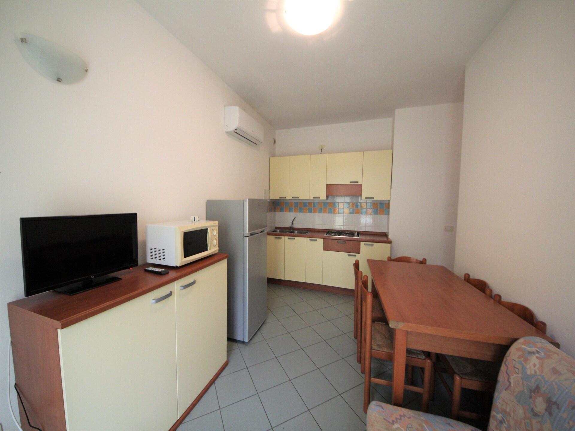 Ruim appartement voor 6 personen bij zee in Rosolina Mare met zwembad - foto 12