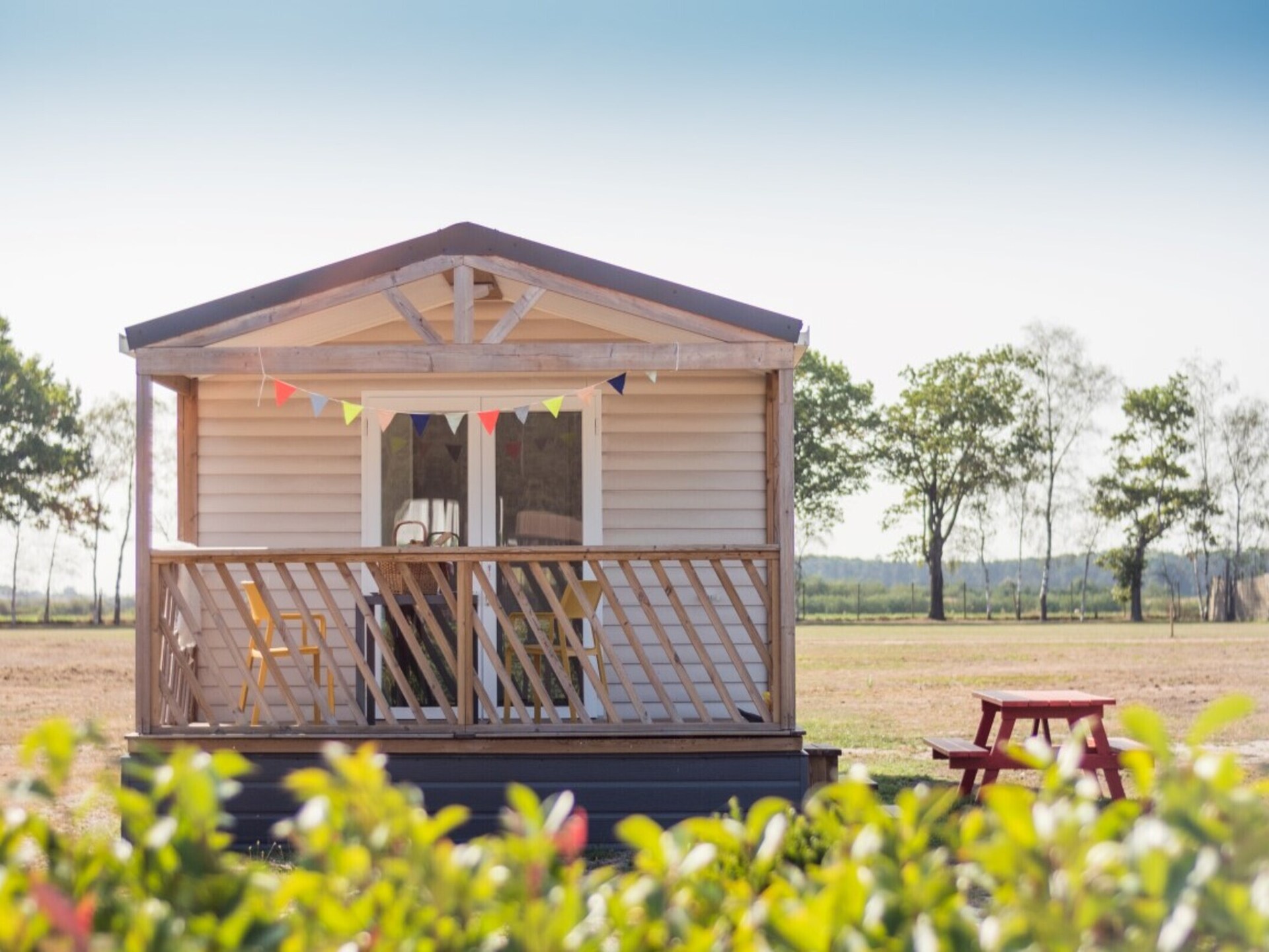 Knusse Beach Lodge aan zwemvijver met zandstrand in Ravels - foto 1
