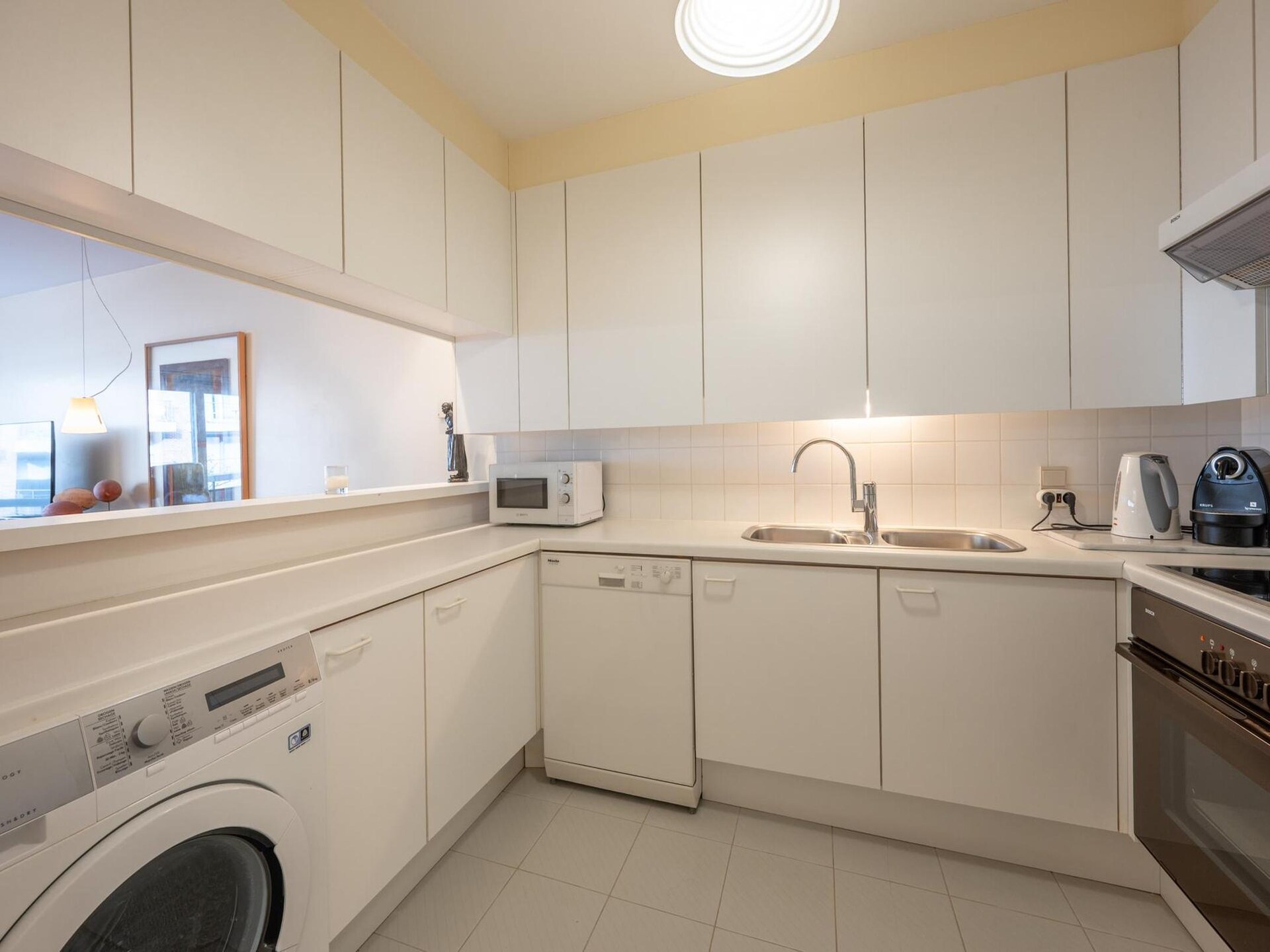 Licht appartement met 2 slaapkamers en panoramisch zeezicht in Oostende - foto 31