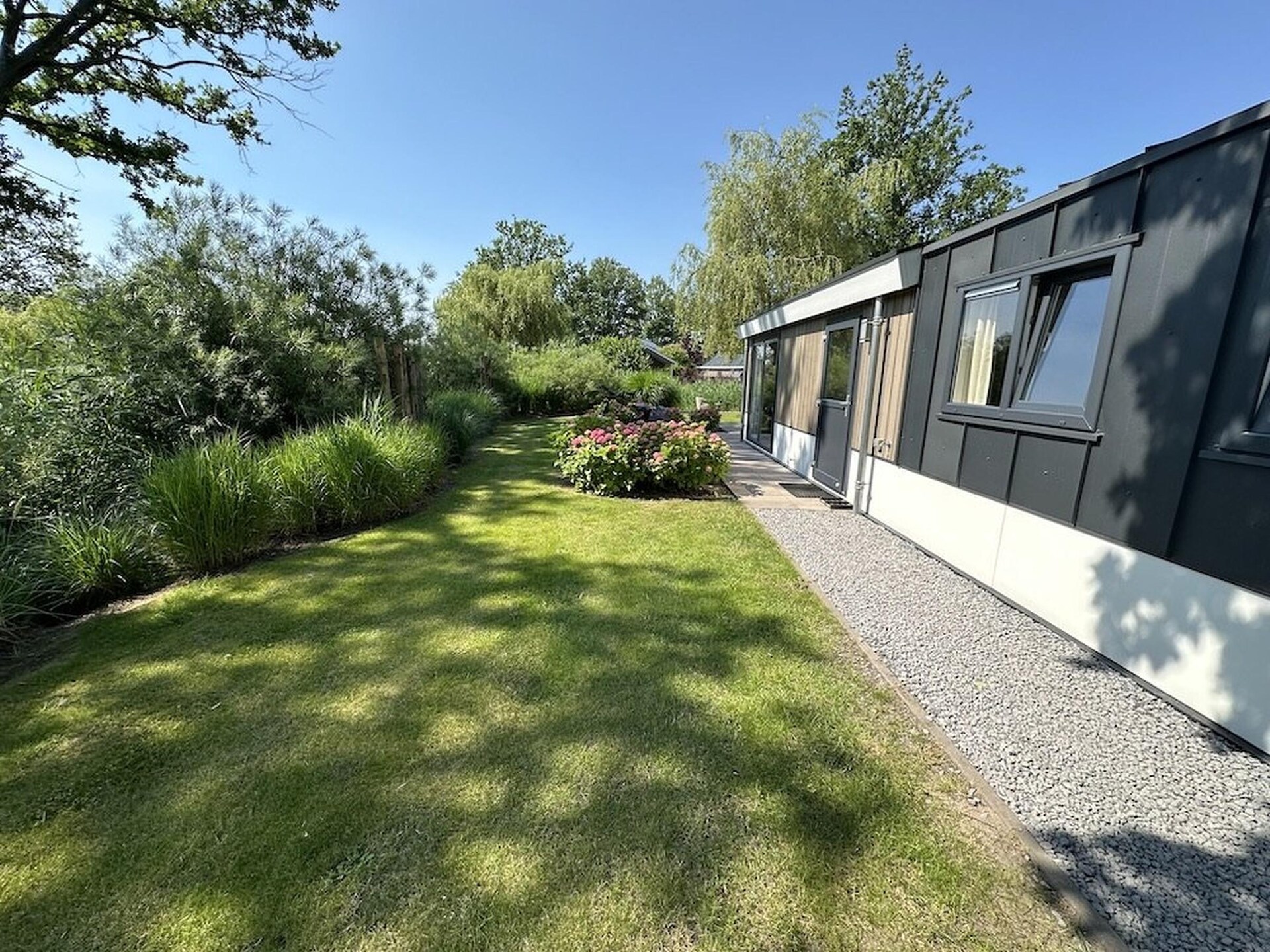 Modern vrijstaand chalet bij Veluwemeer, 6 pers., tuin 729m² - foto 8