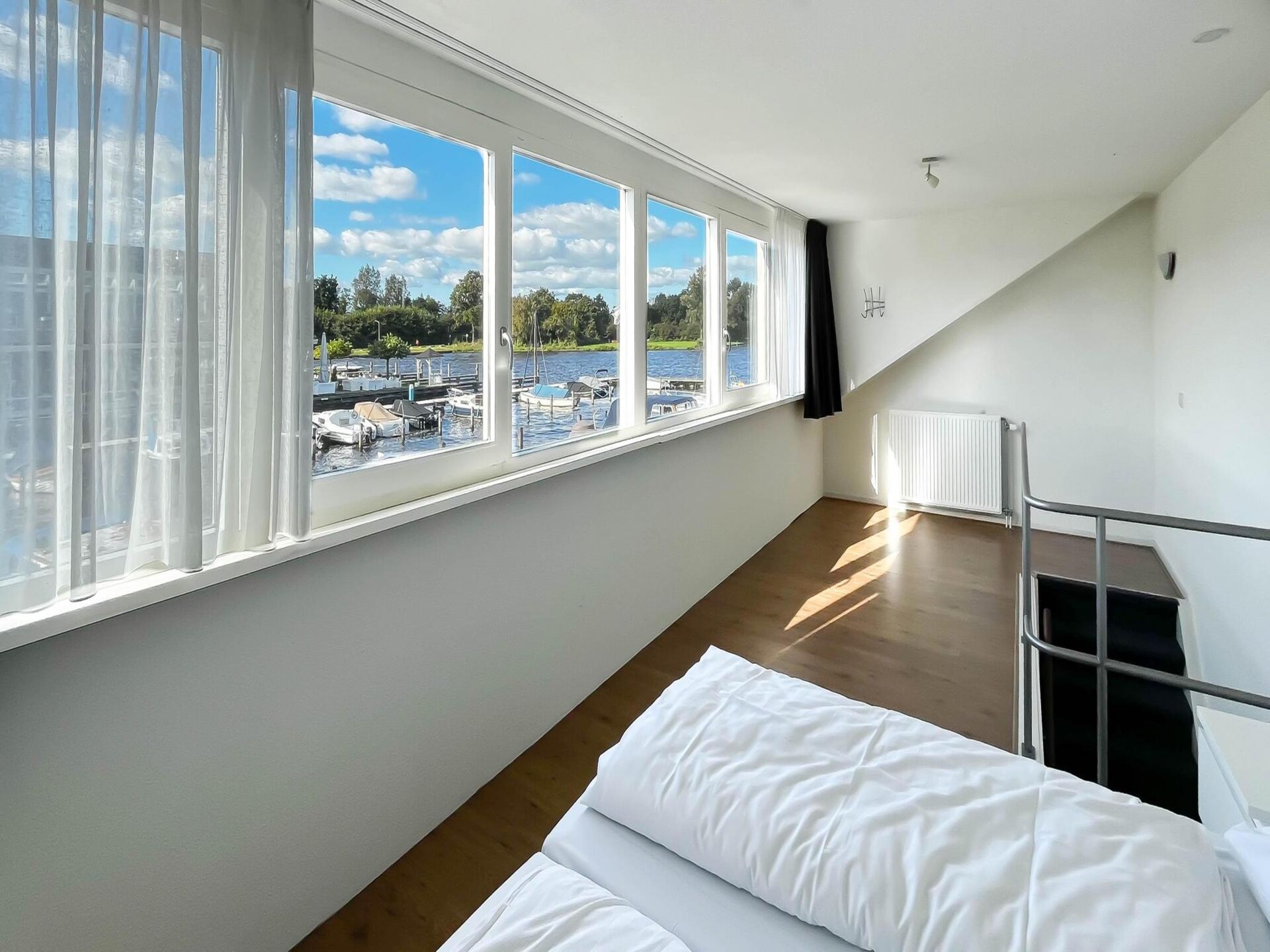 Droomzicht: modern vakantiehuis aan het water bij Uitgeest - foto 15
