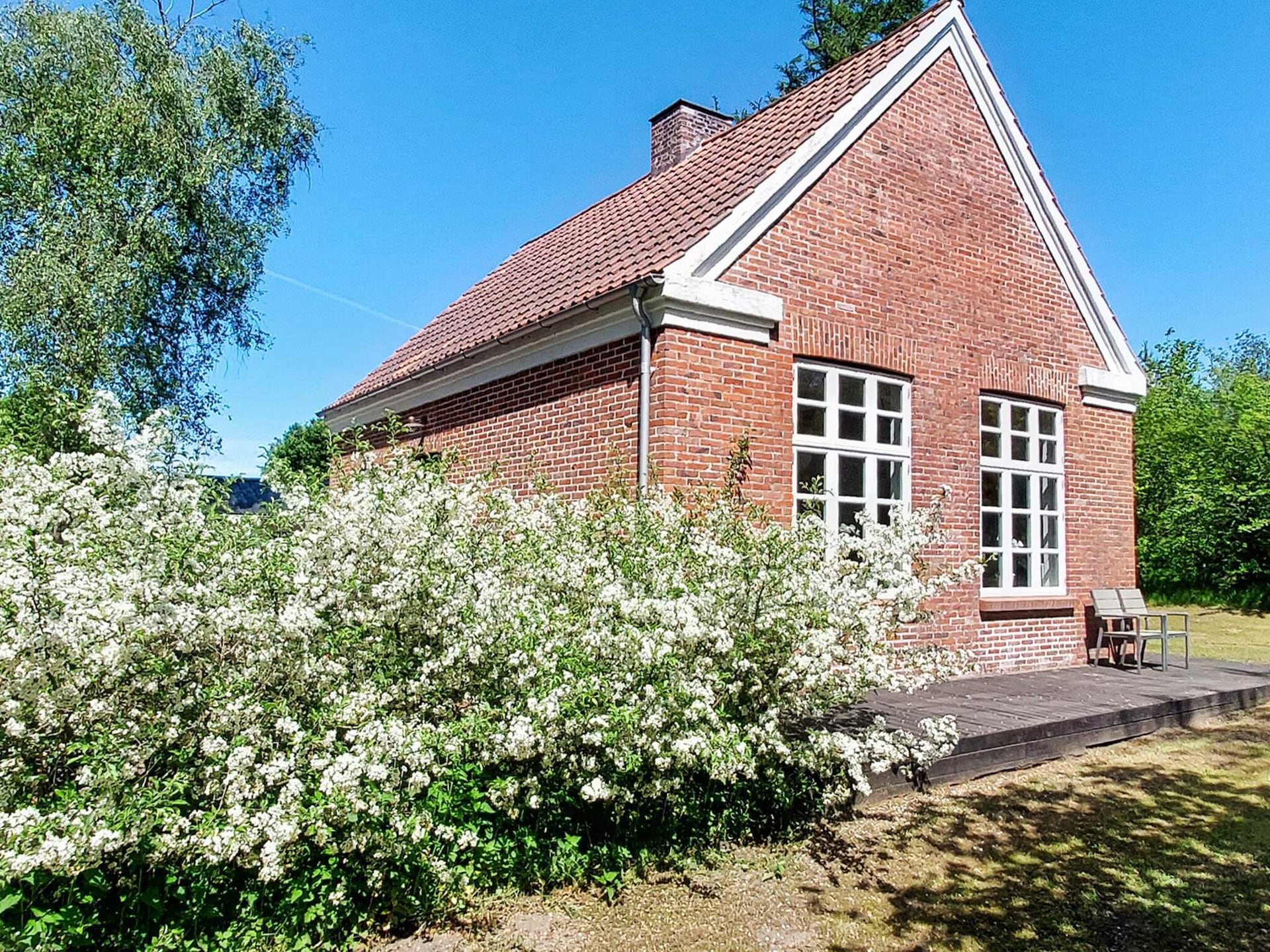 Uniek vakantiehuis in Tim: voormalig schoolgebouw met veel ruimte - foto 1