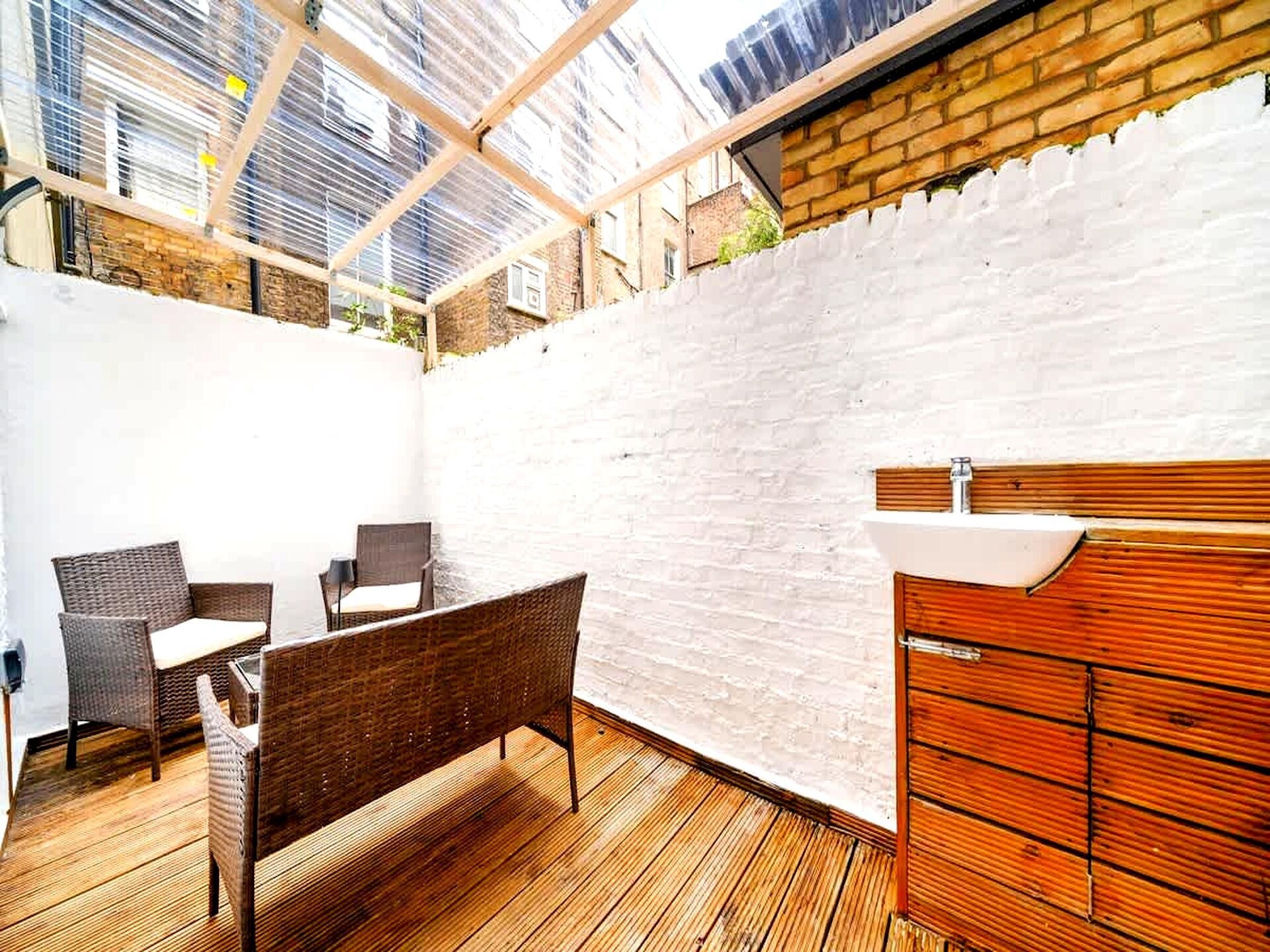 Licht appartement met privétuin op 3 minuten van metro West Kensington - foto 4