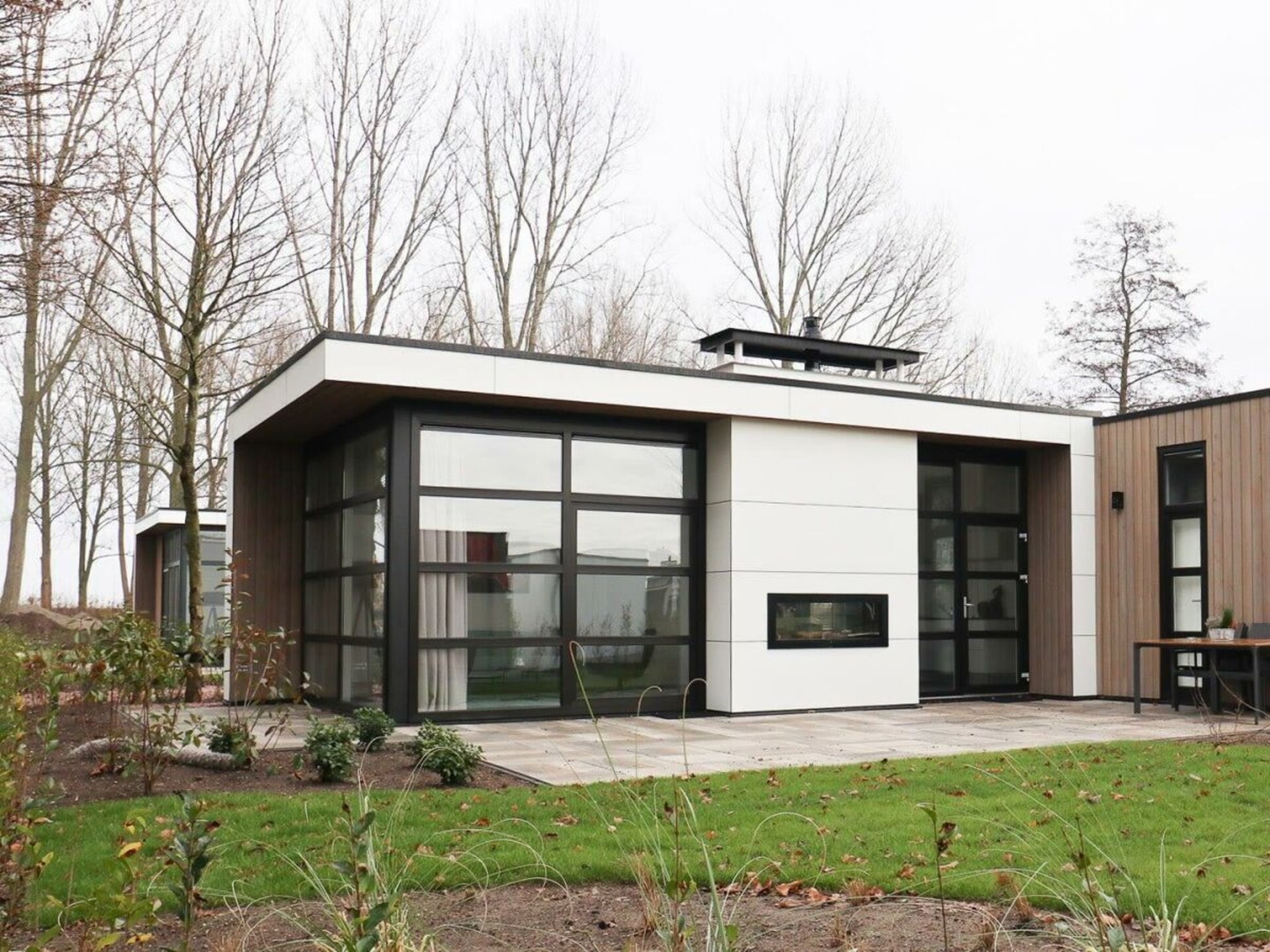 Design chalet L-Cube 6 met open haard en zonneterras in Nijkerk - foto 14