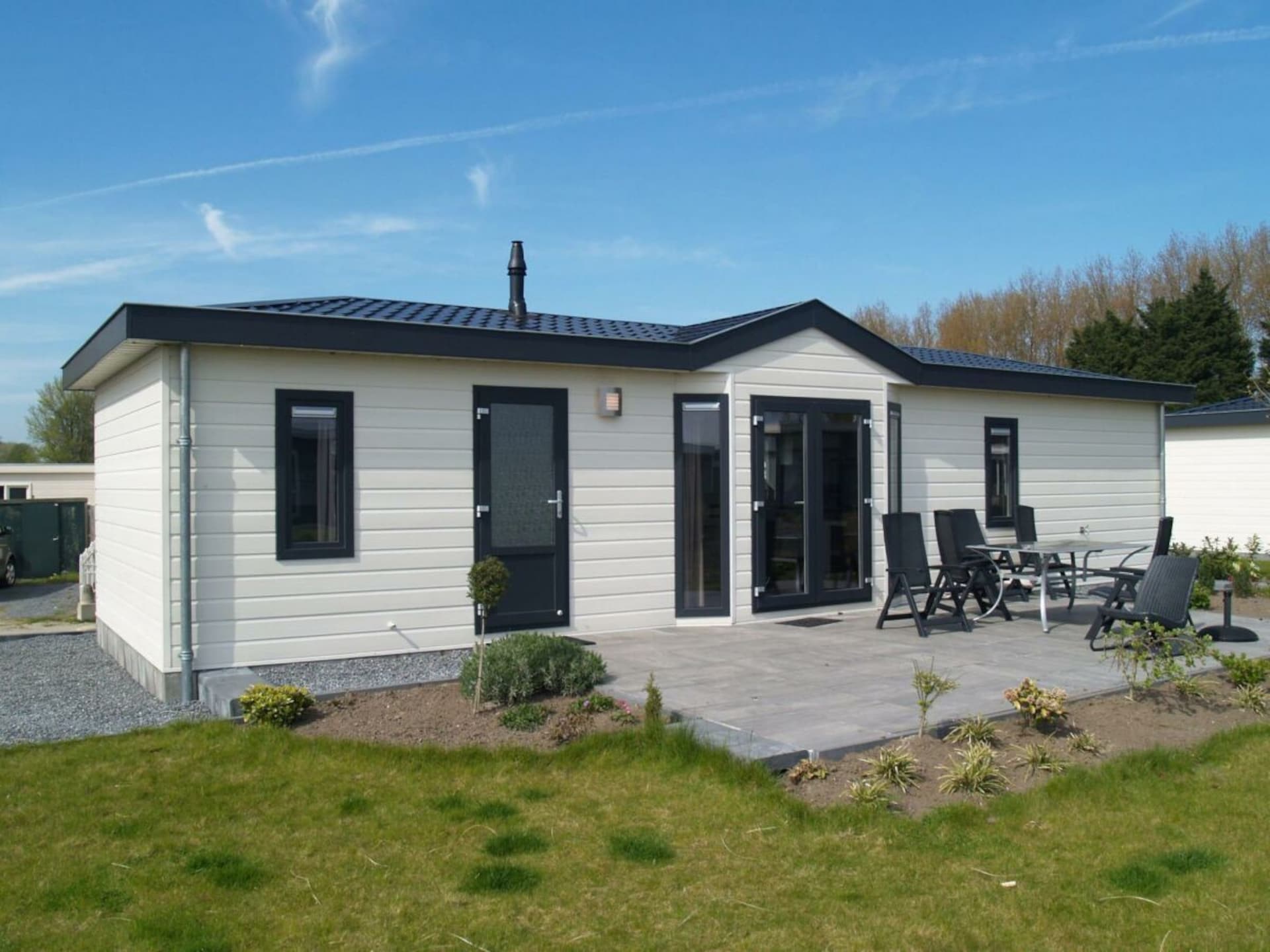 Gelijkvloers chalet voor 6 aan de rand van Dordrecht met terras - foto 1