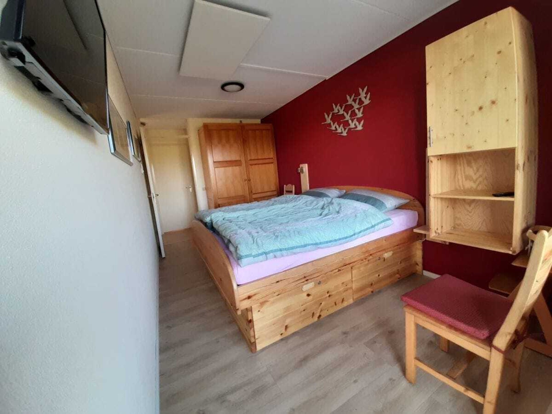 Licht appartement op Ameland met weids uitzicht tot aan het Nesserwoud - foto 9