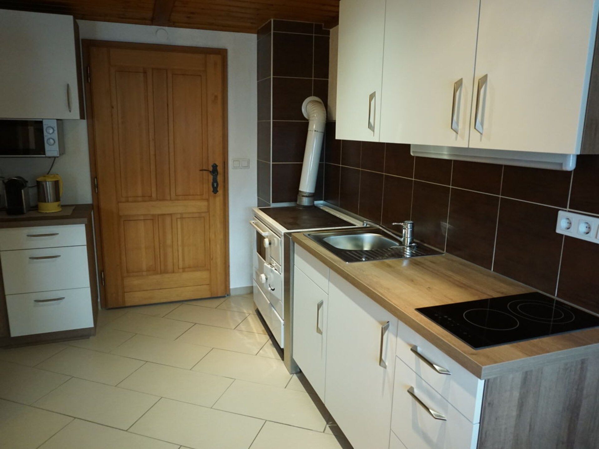 Knus vakantiehuis aan de bosrand in Gnesau met tuin en houtkachel - foto 17