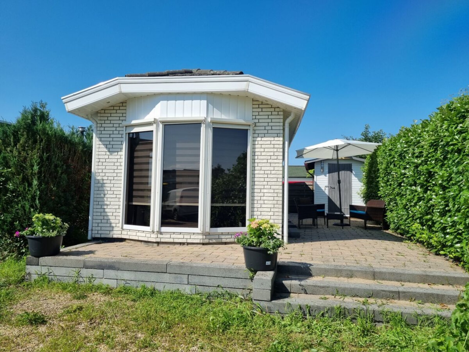 Knus chalet voor 4 personen met zwembad nabij Lathum - foto 1