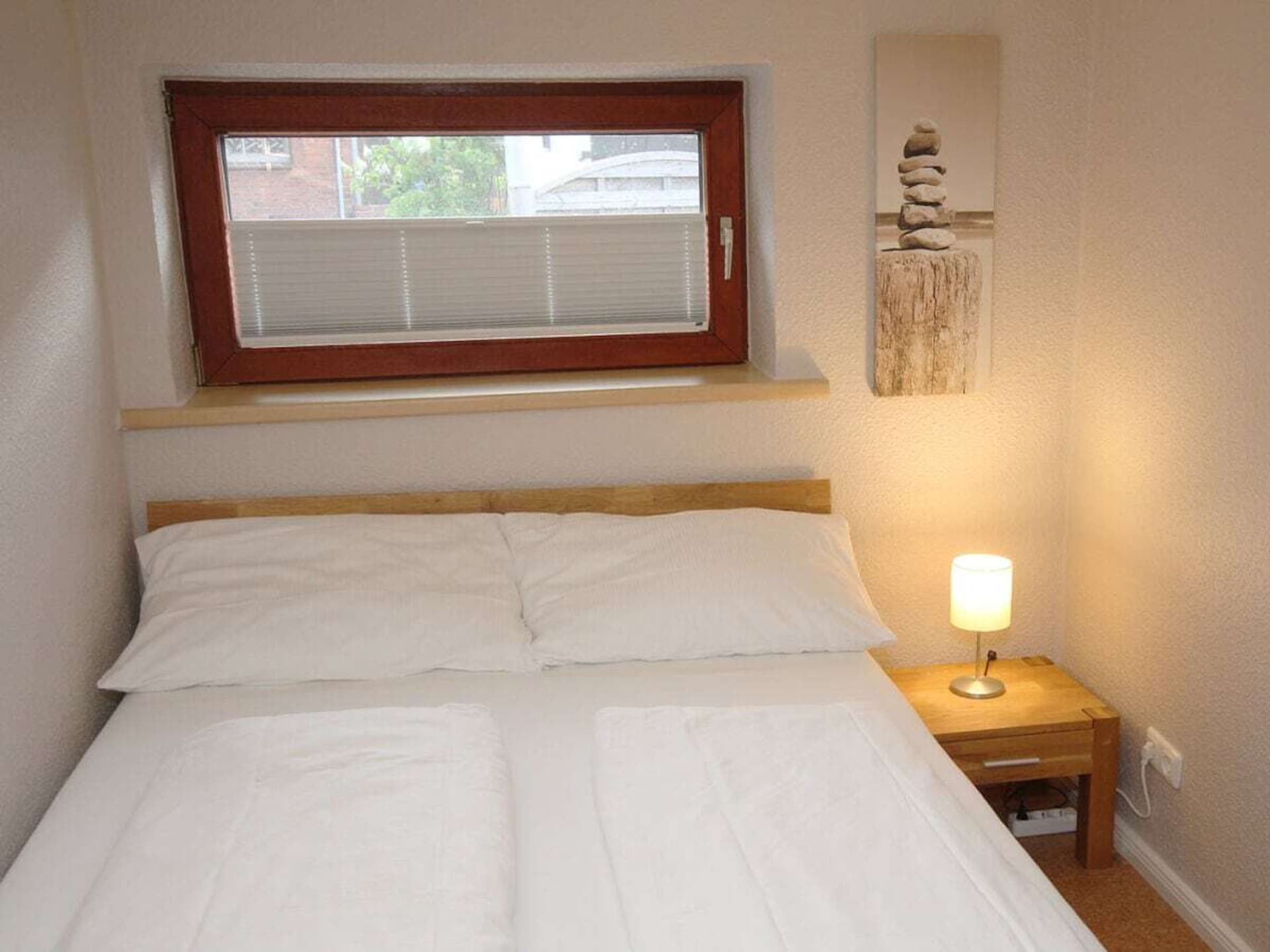 Vissershuisje aan de jachthaven van Lemkenhafen – 4 personen, 3 slaapkamers - foto 9