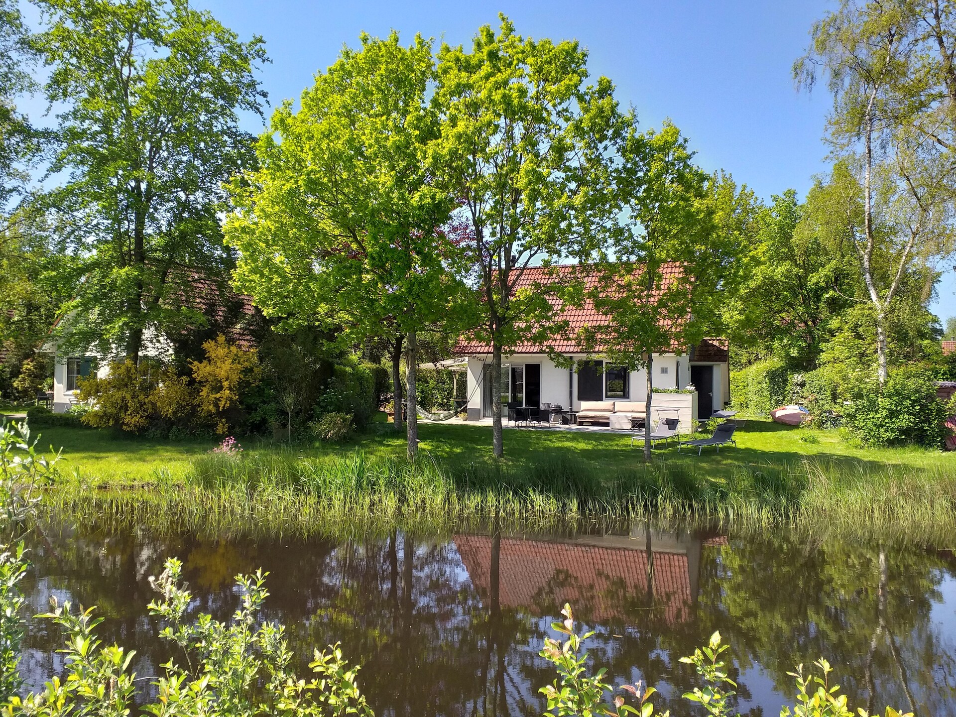Vrijstaande Solovilla aan water in Sint Nicolaasga met tuin - foto 21