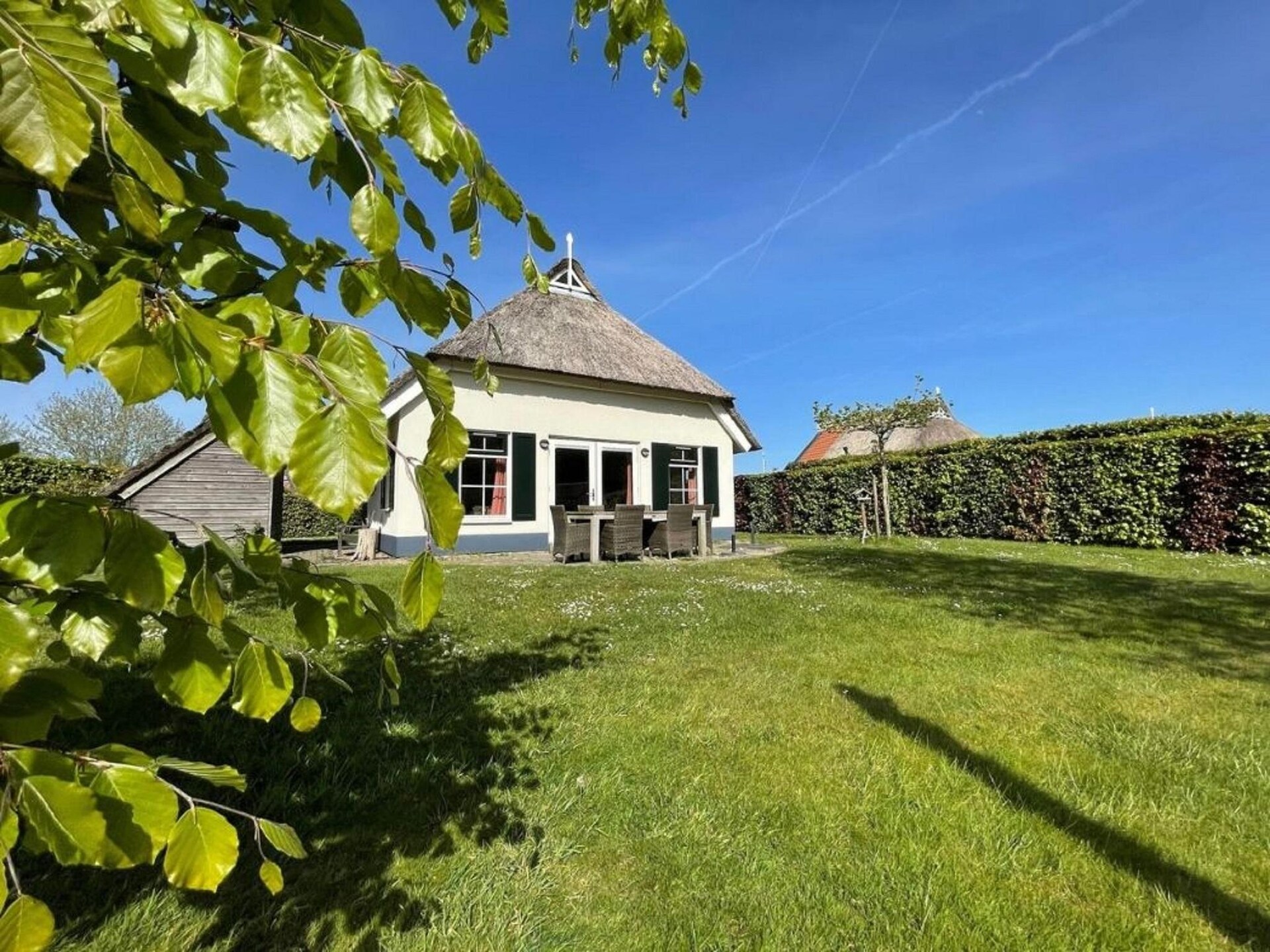 Luxe vrijstaande boerderij aan water met tuin van 1000 m² - foto 15