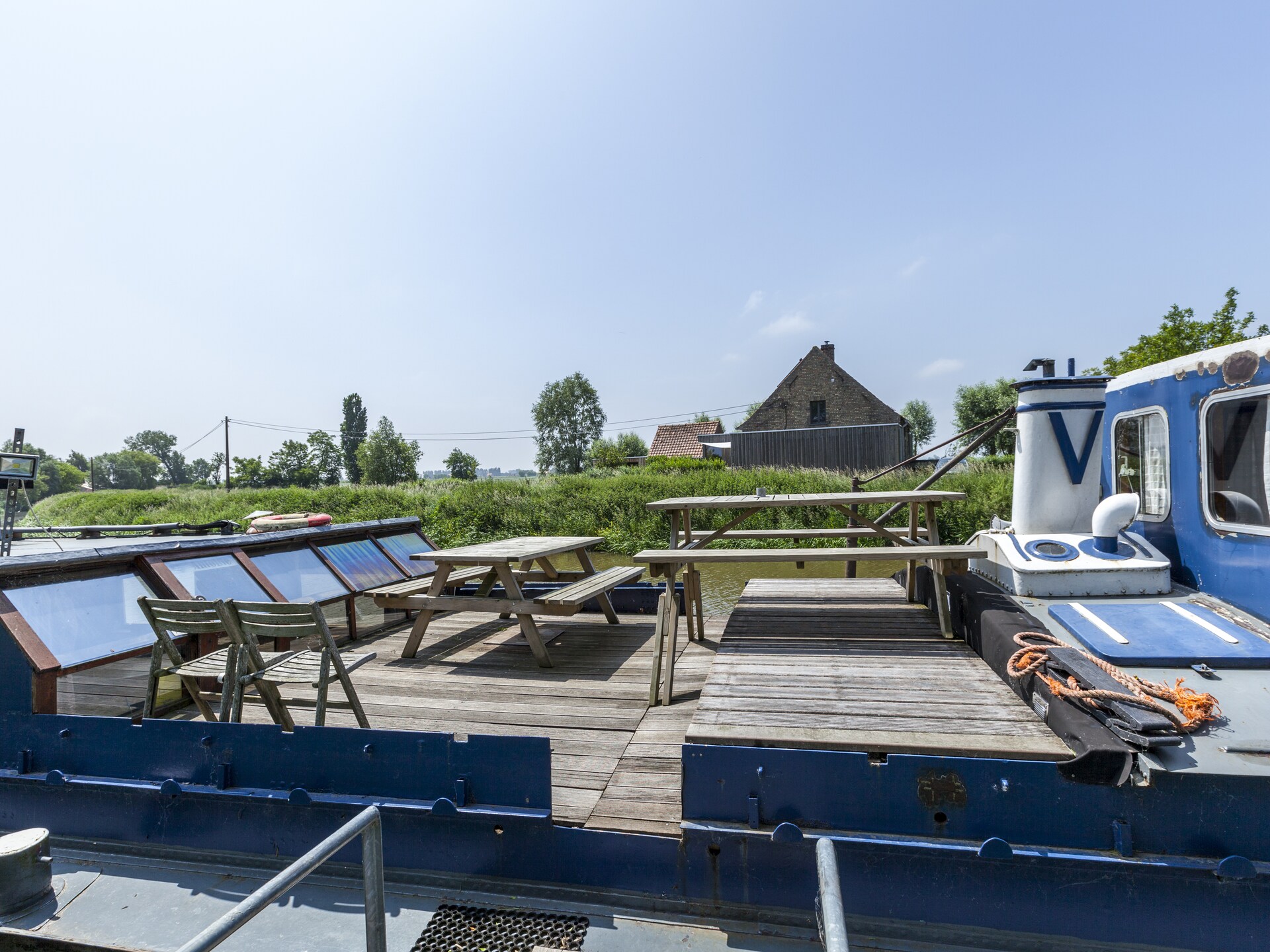 Woonboot voor 15 personen aan het water in Merkem, West-Vlaanderen - foto 6