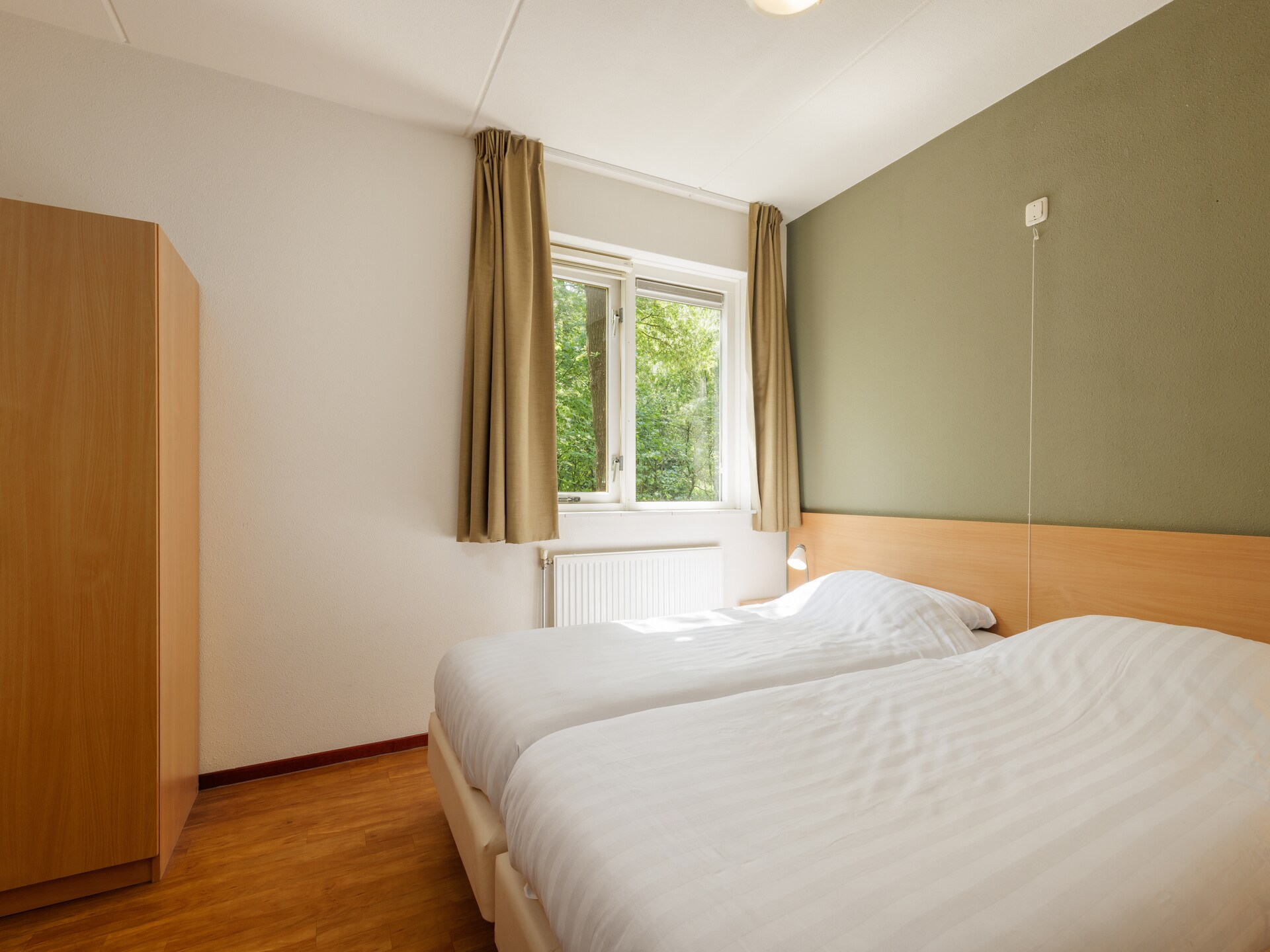 Vrijstaande bungalow voor 7 personen op de Veluwe met tuin en parkfaciliteiten - foto 8