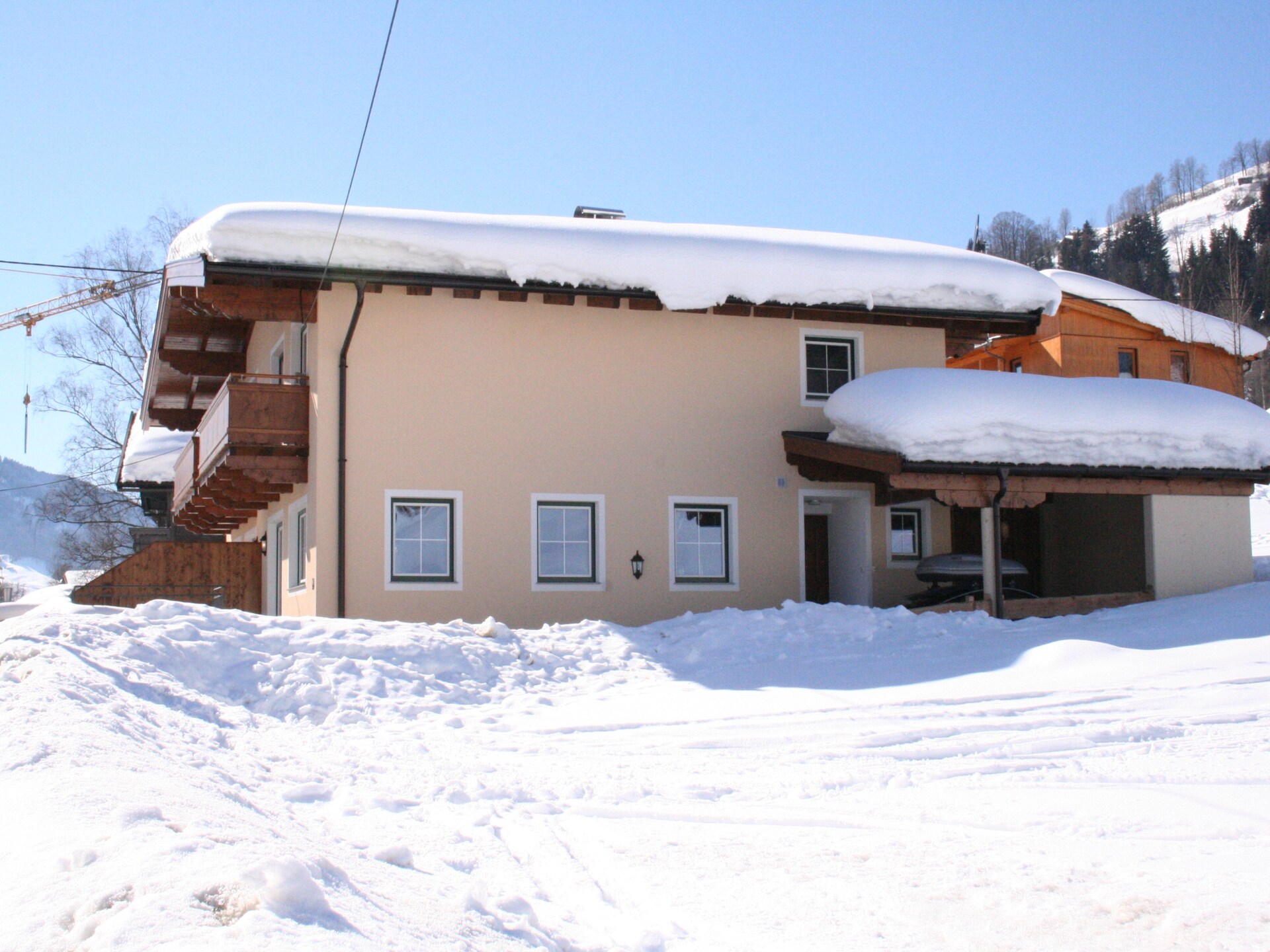 Ruim chalet voor 9 personen in Brixen im Thale, vlakbij de Skiwelt - foto 25