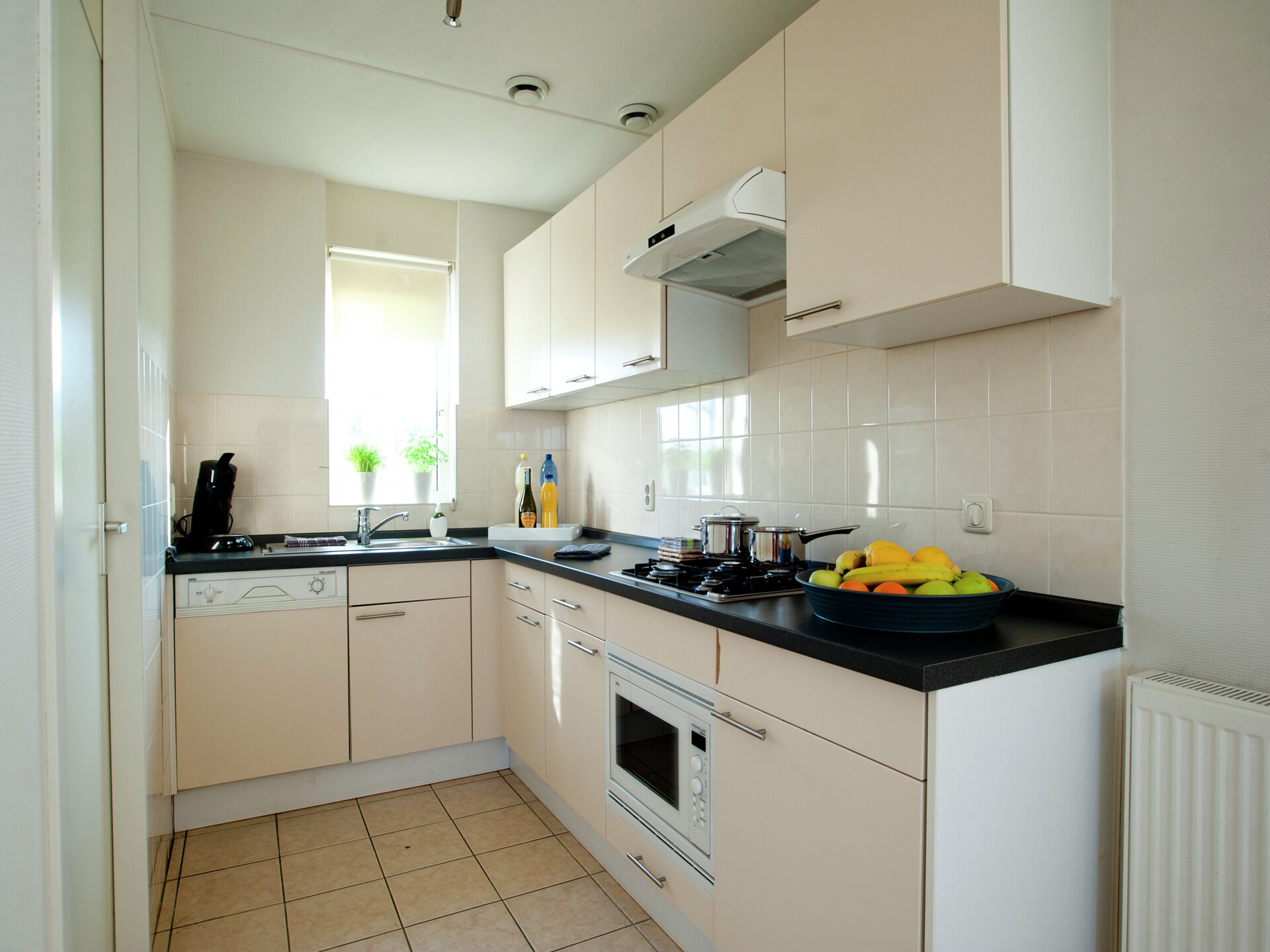 Havenwoning met uitzicht op de Maas in vakantiepark Heel - foto 8