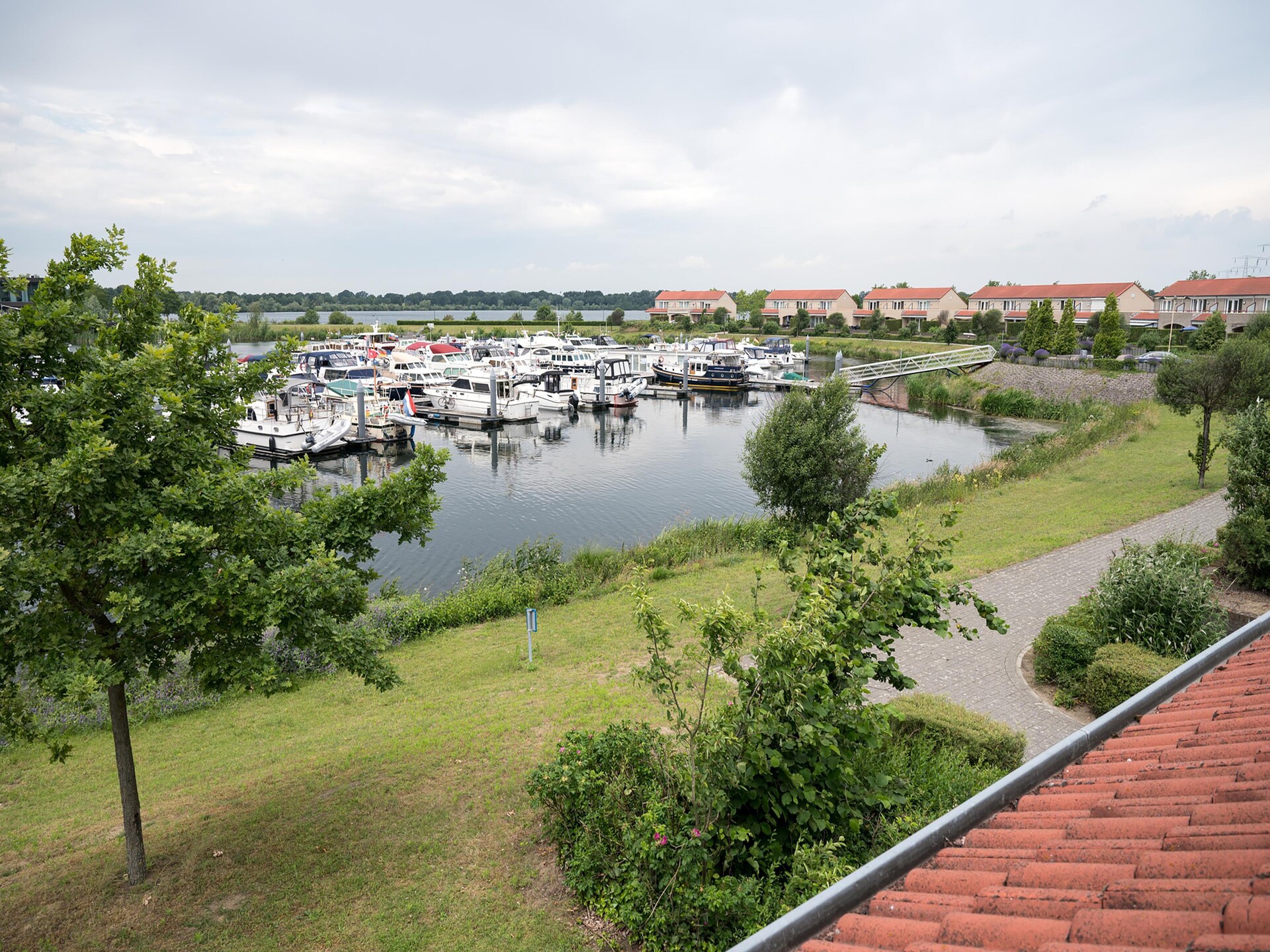 Havenwoning met uitzicht op de Maas in vakantiepark Heel - foto 13