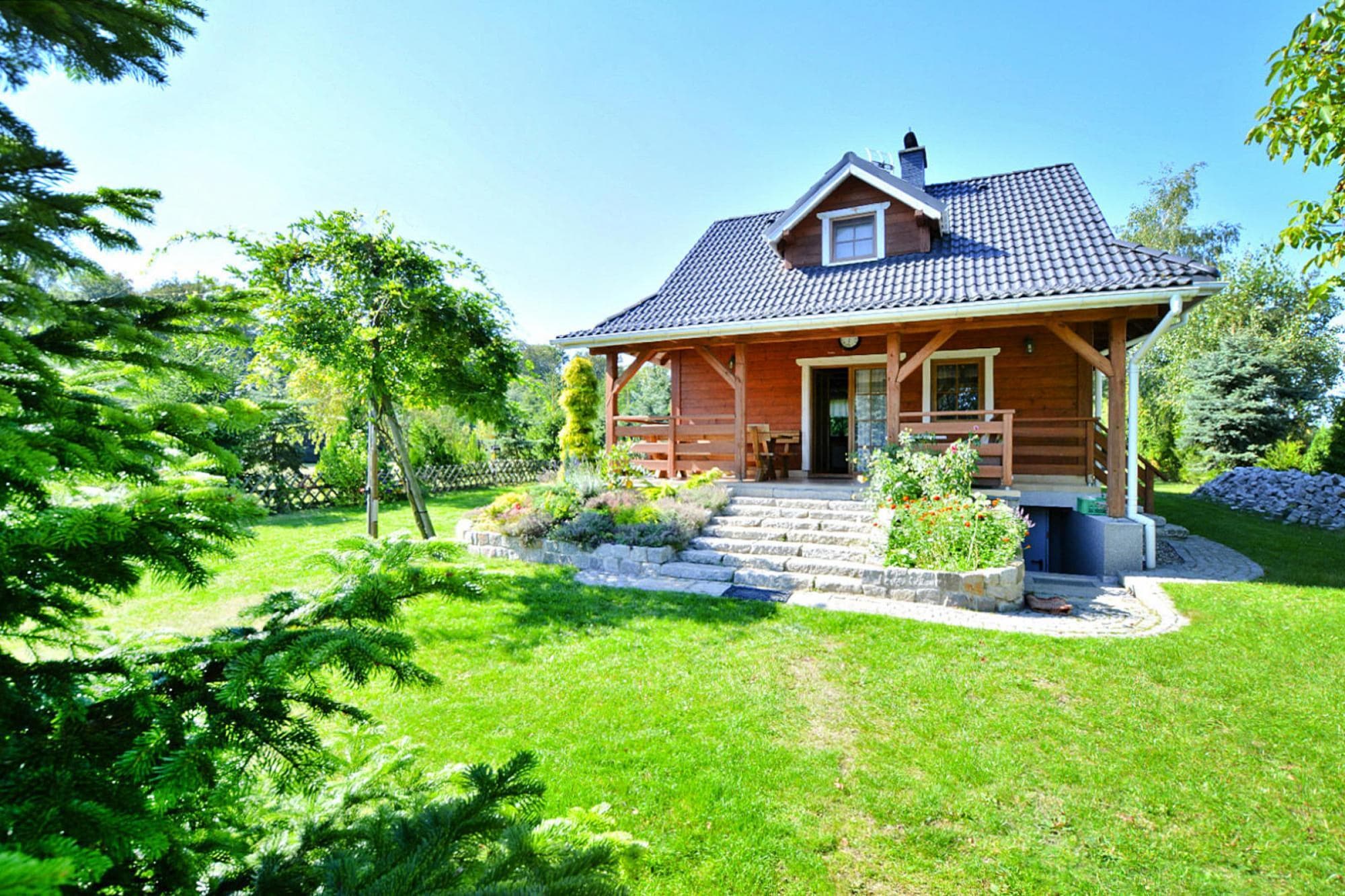 Vakantiehuis met eigen grond bij het meer, Oswino