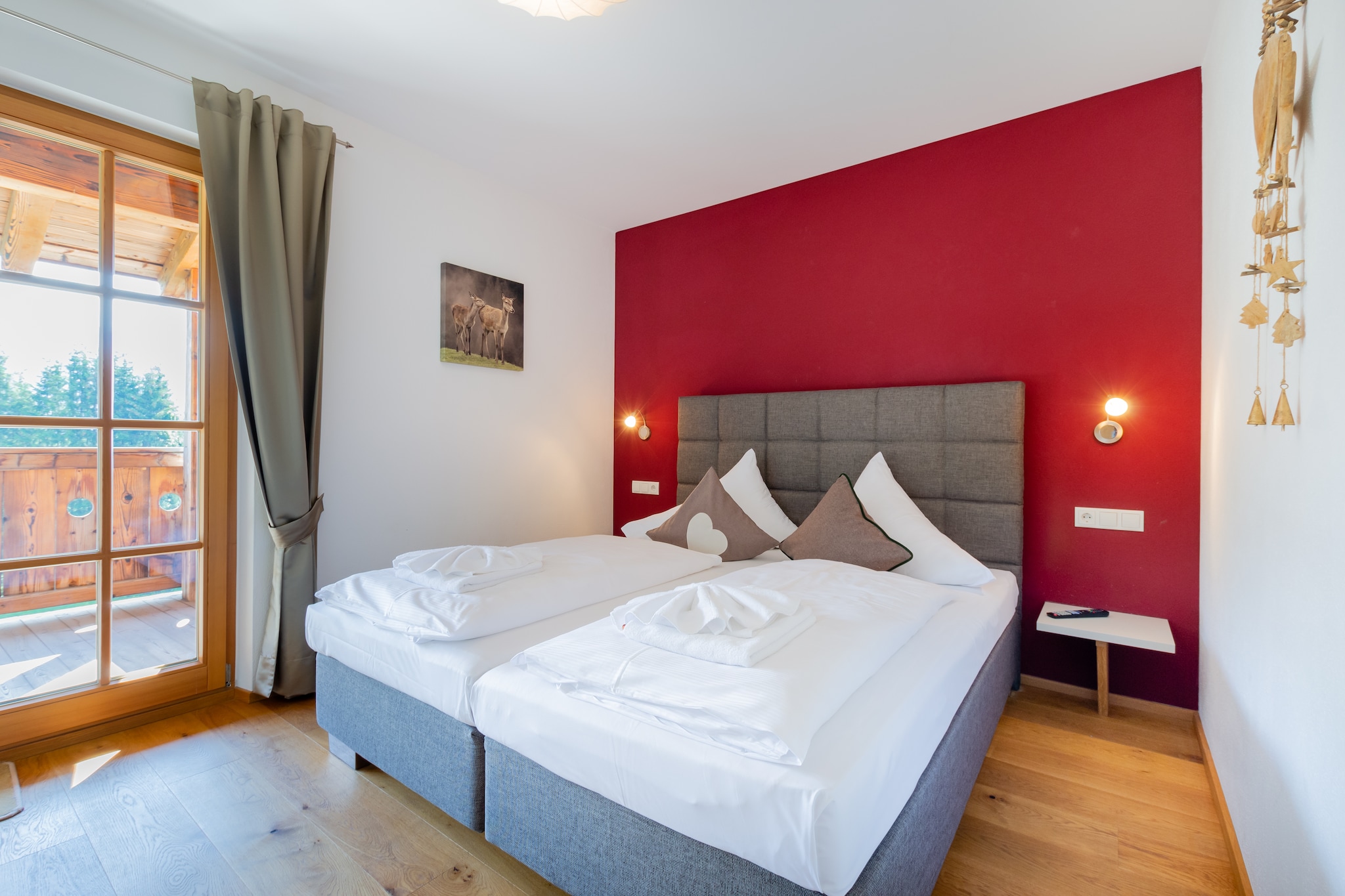 Ground floor: \n\nOn the 2nd floor: (bedroom(double bed), bedroom(double bed), bathroom(shower, 2x washbasin, toilet), sauna(private), balcony)\n\nOn the 3rd floor: (Living room(TV, stereo unit), open kitchen(coffee machine, oven, combination microwave, dishwasher, fridge-freezer), bedroom(double bed), bathroom(shower, washbasin, toilet), balcony)\n\nski storage(ski boot heaters), garage, washing machine, heating(central), terrace, garden(shared with other guests), garden furniture, parking, lift, children\'s bed, high chair