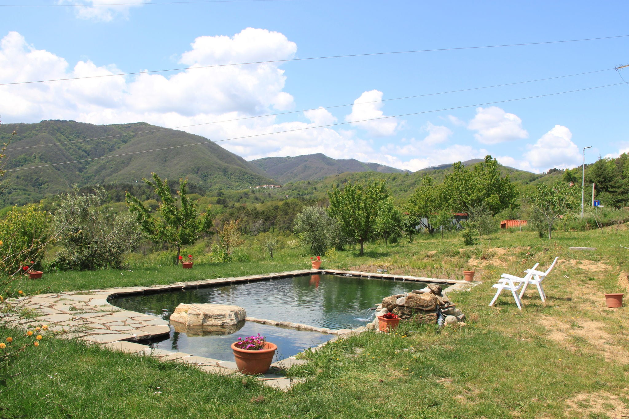 Landelijk appartement in Mulazzo met tuin en zwembad