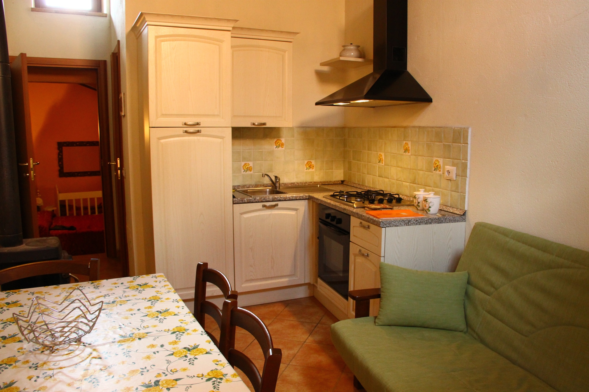 Ground floor: (TV room(shared with other guests)(TV(digital), stove(wood)), relaxation area(shared with other guests)(stove(wood), table football), pantry(shared with the the owner and other guests)(high chair), garden(shared with the the owner and other guests), garden furniture, BBQ, parking, swimming pool(shared with other guests, natural swimming pond, 10 x  6 m., opened from Jan upto and including Jan), play equipment(shared with other guests), bicycles available(paid))\n\nOn the 1st floor: (Living room(acces via outside stairway)(double sofa bed, TV, stove(wood)), open kitchen(cooker(4 ring stoves, ceramic), oven, fridge-freezer), bedroom(double bed, children\'s bed), bathroom(shower, washbasin, toilet, bidet))\n\npatio