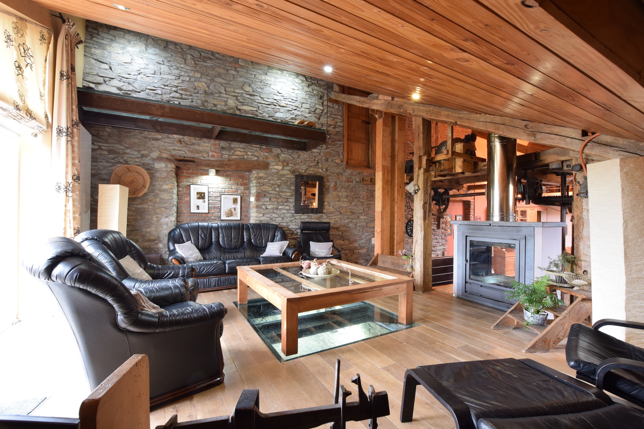 Tucked away in the lush greenery of Bertrix, this beautifully renovated 16th-century watermill offers a tranquil escape for up to 10 guests. With 5 bedrooms, 4 bathrooms, and a private fishing pond, it’s the perfect retreat for families or groups seeking nature, comfort, and a touch of history. The home features an infrared sauna, central heating, and a wood-burning stove for cozy evenings.
Inside, you’ll find a spacious living and dining area, a fully equipped kitchen, and a recreation room with billiards, table football, and a game console. The garden includes a barbecue, boules court, and a 36 m² terrace, ideal for al fresco dining or relaxing by the water. A children’s bed and high chair are also provided, making it family-friendly.
Located just 5 km from Paliseul, with restaurants, supermarkets, and outdoor activities nearby, the home is also close to Semois, Bouillon, and scenic hiking and mountain biking trails. Whether you're casting a line in the private pond or exploring the Ardennes, this charming mill offers a peaceful and playful countryside experience.