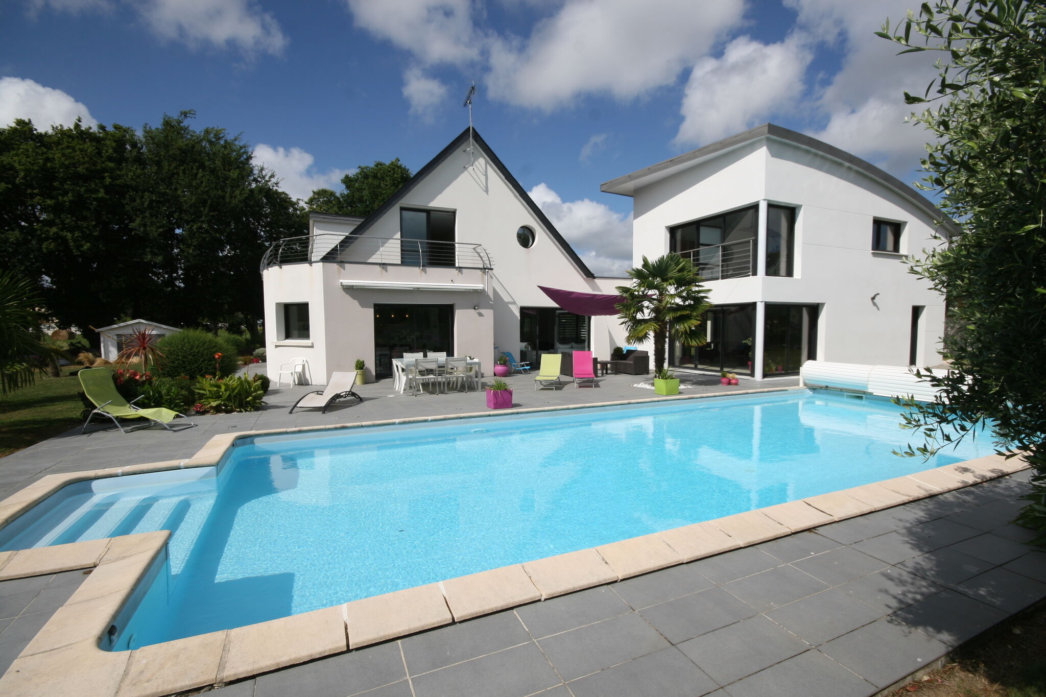 Modern villa with private heated pool, located 2 km from the sandy beach.
