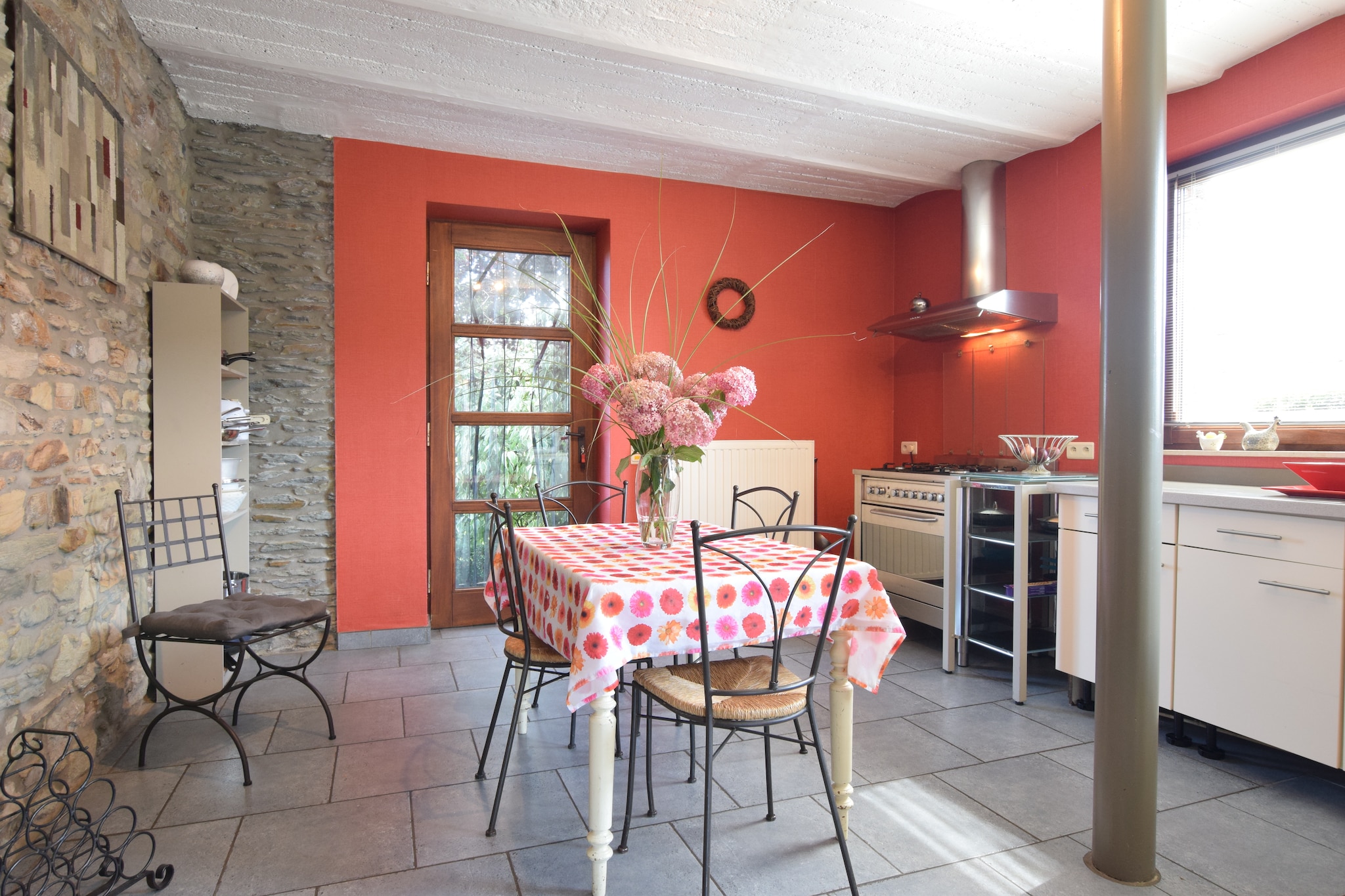 Ground floor: (hallway(washbasin), Sitting room(TV, dining table(9 persons), stove(wood), DVD player, radio), dining room, open kitchen(dining table(4 persons), cooker(gas), coffee machine(filter), oven, microwave, dishwasher, fridge, 2x high chair), toilet, washing room(washing machine))\n\nOn the 1st floor: (bedroom(double bed(140 x 200 cm)), bedroom(double bed(160 x 200 cm), washbasin), bedroom(3x single bed(90 x 200 cm), bunk bed(90 x 200 cm), washbasin), bathroom(shower), bathroom(bath tub, washbasin, toilet), recreation room)\n\nfireplace, bathtub or shower, washing machine, heating(central), terrace, garden, bicycle storage, garden furniture, BBQ, parking, trampoline, parasol, changing mat, changing mat, play equipment, fitness equipment, children\'s bed, children\'s bed, high chair, high chair, ironing board, party games