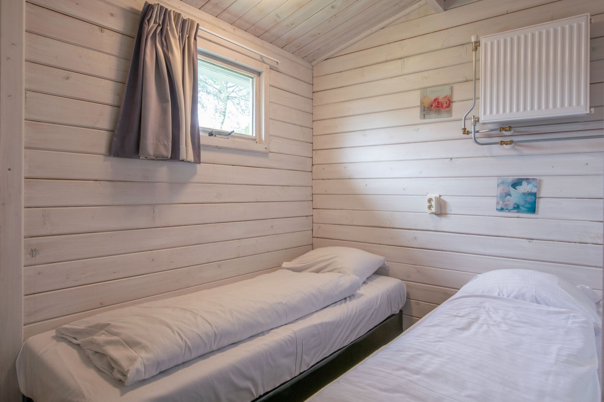 Cosy, wooden chalet with dishwasher, in a car-free zone