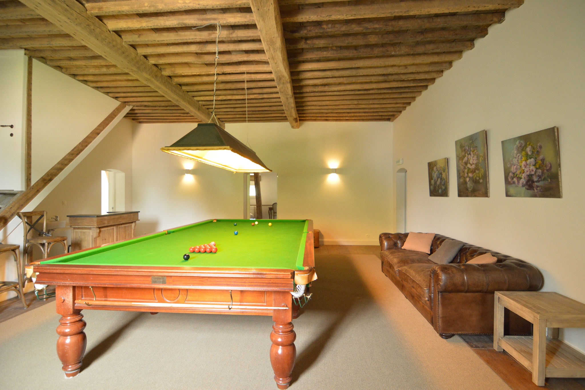 Ground floor: (hallway(toilet), Living room(TV(flatscreen, satellite), fireplace, DVD player, radio, CD player, stereo unit), Sitting room, Sitting room, dining room(dining table), Kitchen(cooker(induction), coffee machine(cups, filter), oven(grill-oven), microwave, 2x dishwasher, 2x fridge, freezer))\n\nOn the 1st floor: (Bedroom with bathroom(2x single bed, bathtub with shower, toilet), Bedroom with bathroom(2x single bed, toilet), Bedroom with bathroom(2x single bed, toilet), Bedroom with bathroom(2x single bed, toilet), Bedroom with bathroom(2x single bed, toilet), Bedroom with bathroom(2x single bed, toilet), Bedroom with bathroom(2x single bed, toilet))\n\nOn the 2nd floor: (hallway(billiards), Bedroom with bathroom(2x single bed, toilet), Bedroom with bathroom(2x single bed, toilet), Bedroom with bathroom(2x single bed, toilet), Bedroom with bathroom(2x single bed, toilet), Bedroom with bathroom(4x single bed, toilet), Bedroom with bathroom(4x single bed, toilet), bathroom(bathtub with shower, toilet), bathroom(shower, toilet), playroom(table tennis table), fitness room(fitness equipment), hall(8x single bed), infrared sauna)\n\ntumble dryer, heating(central), terrace(55 m2), garden(partially fenced), garden furniture, BBQ, parking, trampoline, pond, parasol, children\'s bed