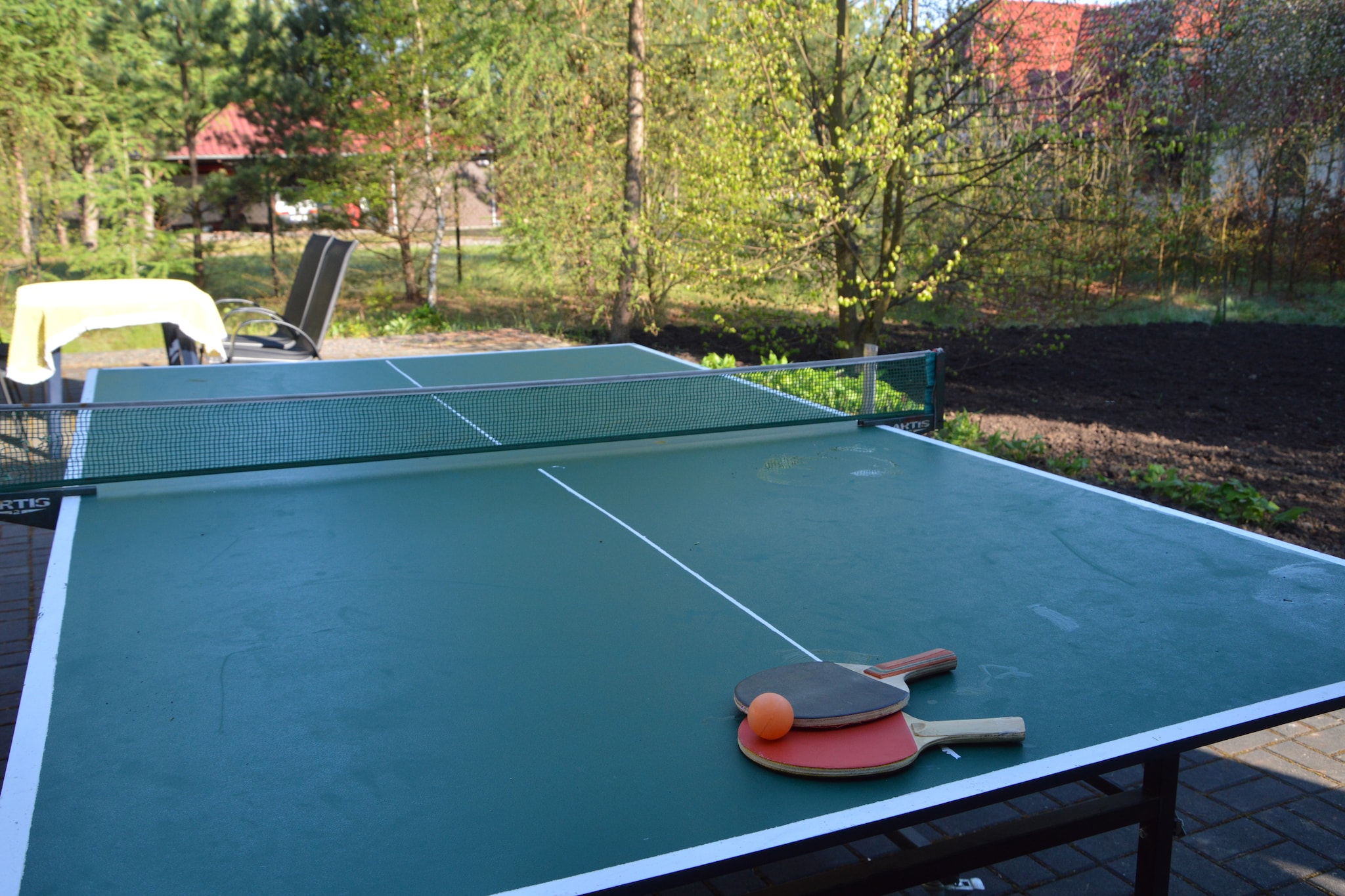 Ground floor: (hallway(toilet), Kitchen(hood, coffee machine, combination microwave, dishwasher, fridge-freezer), Living/diningroom(double sofa bed, TV(satellite), fireplace), bathroom(bath tub, shower, washbasin), relaxation area(shower, sauna), garden doors)\n\nmezzanine: \n\nOn the 1st floor: (bedroom(double bed), bedroom(2x single bed), bedroom(2x single bed, double bed), bathroom(shower, washbasin, toilet))\n\ngarage, tumble dryer, washing machine, heating(floor heating), terrace, terrace(roofed), garden, garden furniture, table tennis table, billiards, bicycles available