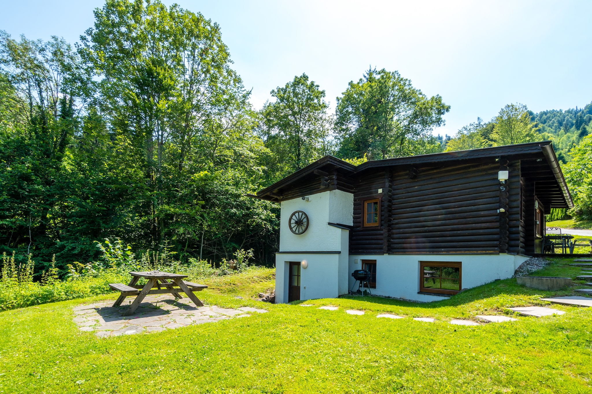 This cozy chalet in Wörgl, Austria, offers a lovely private terrace and (in summer) a beautiful green landscape. With 4 bedrooms, it can accommodate up to 6 guests. You have access to the first floor and the basement, which is accessible from outside. The basement has spacious bedrooms and is also equipped with a bathroom.
During the winter months, this option is ideal for winter sports enthusiasts. Start your morning with a brisk walk through the forest, which is just 100 meters from the accommodation. Then you can do your shopping at the supermarket 4 km away or at the bakery (2.5 km). The nearest restaurant, where you can enjoy a delicious dinner in the evening, is 2 km away.
The vacation home has a total of 2 bathrooms including a shower, a sink and a toilet. If you choose not to eat out one evening, you can prepare a delicious dinner yourself in the well-equipped kitchen. The chalet also has a private garden and a private terrace, furnished with garden furniture. There are also 2 private parking spaces available. The nearest ski bus stop is 1.2 km away.