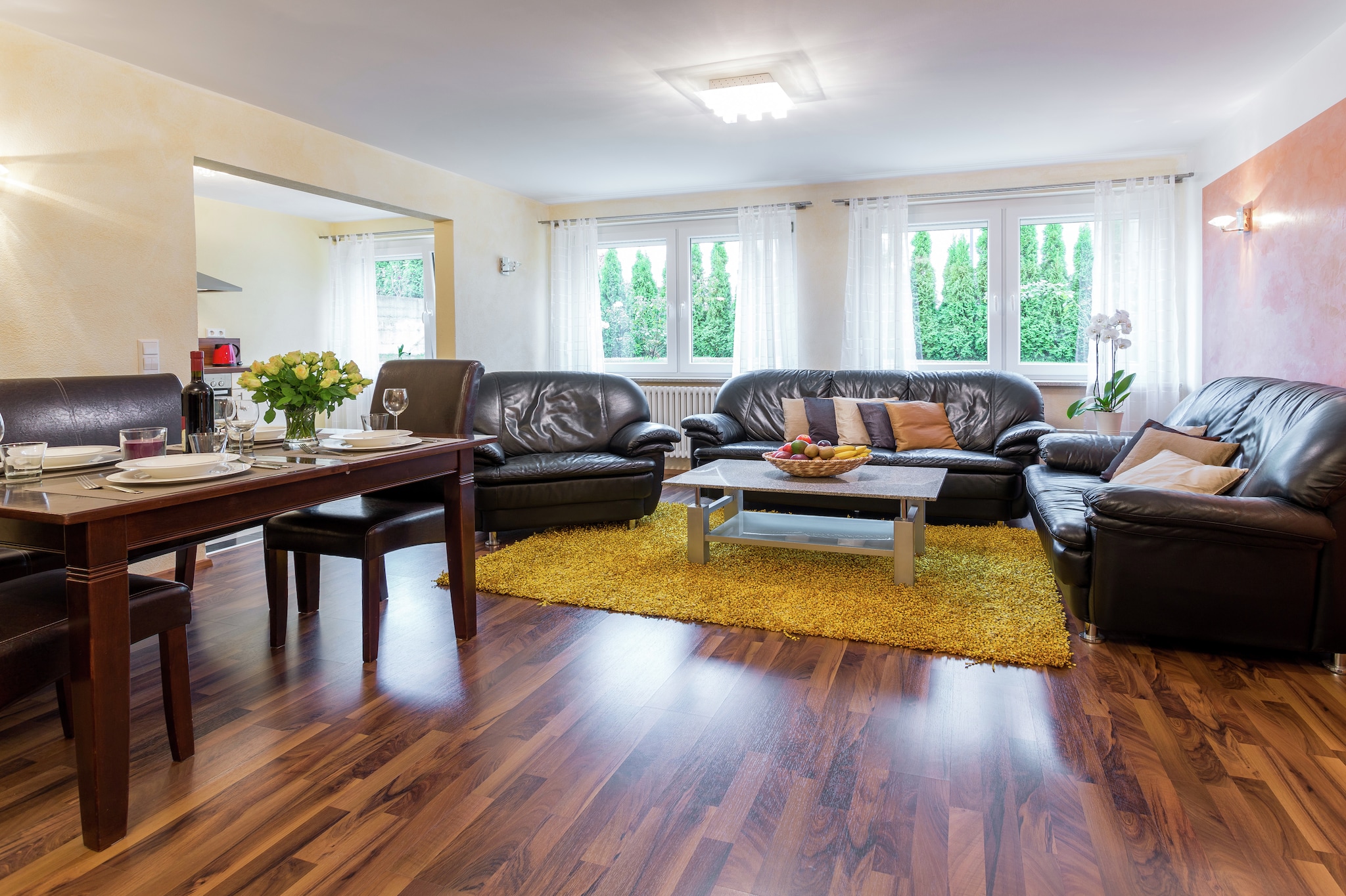 This charming basement-level apartment in Markdorf offers a cozy and pet-friendly retreat for families or small groups. It features two bedrooms, one with a double bed and another with bunk beds, a spacious living/dining room with satellite TV, DVD player, and a double sofa bed, plus a fully equipped kitchen with ceramic and induction cooktops, oven, microwave, and dishwasher. A private terrace and partially fenced garden with barbecue and furniture provide space to relax outdoors.

Guests enjoy central heating, a bath tub, paid laundry facilities, and access to a shared swimming pool open from May to October. Additional amenities include a cot, ironing board, sun loungers, deckchairs, and private parking. 

Nearby, explore the scenic Gehrenbergturm for panoramic views, visit the historic Nikolauskirche, or stroll through the charming Obertor gate. For cultural outings, the Zeppelin Museum and Meersburg Castle are just a short drive away. Dining options include Gentile Pizza Express, Restaurant Untertor, and Die Hofschenke By Wirthshof, all within walking distance. With lakes, trails, and heritage sites nearby, this apartment is a perfect base for your Bodensee adventure.