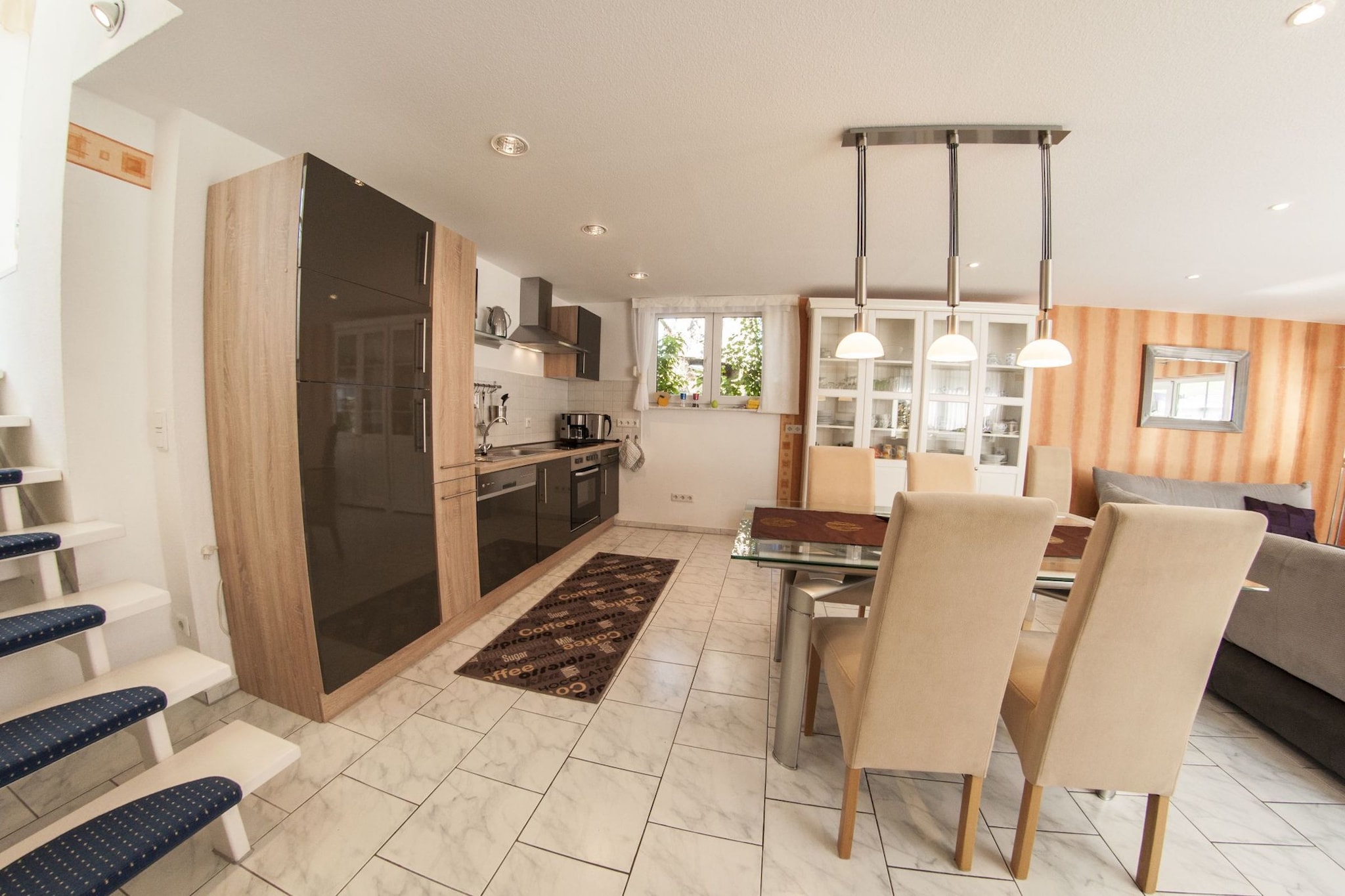 Ground floor: (Entrance, hall, open kitchen(electric kettle, toaster, cooker(4 ring stoves, ceramic), coffee machine(filter), oven, dishwasher, fridge(+ freezer)), Living/diningroom(TV(flatscreen, satellite, dutch television channels), DVD player, radio, stereo unit), bathroom(shower, washbasin, toilet, hairdryer))\n\nOn the 1st floor: (bedroom(single sofa bed, double bed(180 x 200 cm)), walk-through bedroom(double bed(180 x 200 cm)))\n\nheating(central, floor heating), air conditioning, terrace(private, 10 m2), garden(shared with the owner , partially fenced, 240 m2), garden furniture, BBQ, parking, deckchairs, parasol, high chair, party games, toys, insect screens, Swing set