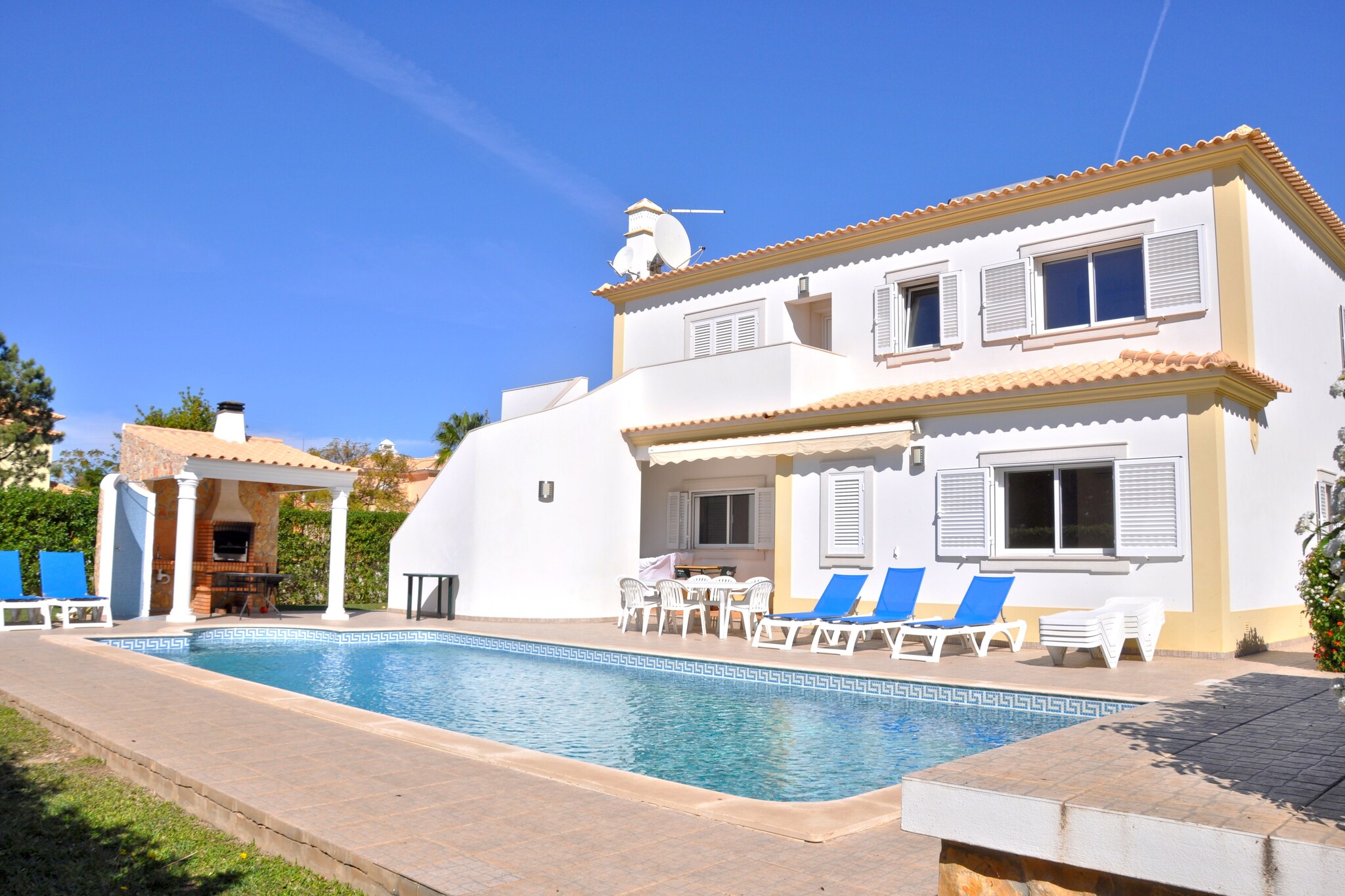 Located in Vilamoura in Loulé, this villa has a private swimming pool, private garden and free WiFi, families can enjoy a comfortable stay here. It has 3 bedrooms and can accommodate 6 guests.In the vicinity, you can go ballooning, bird watching, to the movies, gamble in the casino, take a day trip by boat, or enjoy excursions by jeep safari to explore the beautiful local landscape. You can visit the beachfront bars in Quarteira, just 5 mins away. The beach is located at a distance of 5 km. Guests can light up the fireplace for warmth while an air conditioning facility is also available. The kitchen is well equipped with oven, cooker, microwave and refrigerator. Guests can also cozy around a hot barbecue in the garden with garden furniture or by the swimming pool. A washing machine is also available. A cot and high chair are also available at a small fee.
About Belvilla
When you stay in a Belvilla home, you can rest assured of a unique holiday home in ideal surroundings at an attractive price. The portfolio of accommodations consists of more than 40,000-holiday homes in 20 European countries. Interested in a weekend getaway, a summer or winter sports holiday or simply a short break? Do you prefer the coast, the countryside or the mountains? Whatever your preference, there is a Belvilla home to meet your needs, from a cosy gîte for two to a castle big enough for the entire family, from an apartment in the heart of Rome to a cabin in the middle of nowhere, from a simple tree house to a luxury dream villa and from close to home to the other side of Europe.
A Belvilla home gives you the freedom to enjoy breakfast in your pyjamas or continue a good conversation into the morning hours without having to worry about the bar's closing time. Prepare gourmet meals with fresh local ingredients in your own kitchen and take advantage of having your own swimming pool to do as many cannonballs as you want! In other words, you can enjoy complete privacy in your home away from home.