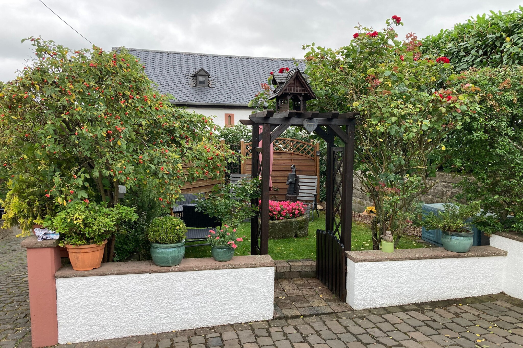 Ground floor: (hallway, Living room(double sofa bed, TV, dining table, DVD player, CD player, coffee machine, 2x bicycles available(on request)), open kitchen(cooker(4 ring stoves), oven, microwave, fridge-freezer), bedroom(double bed), bathroom(bathtub with shower, washbasin, toilet))\n\nBasement: \n\ngarden, garden furniture, parking