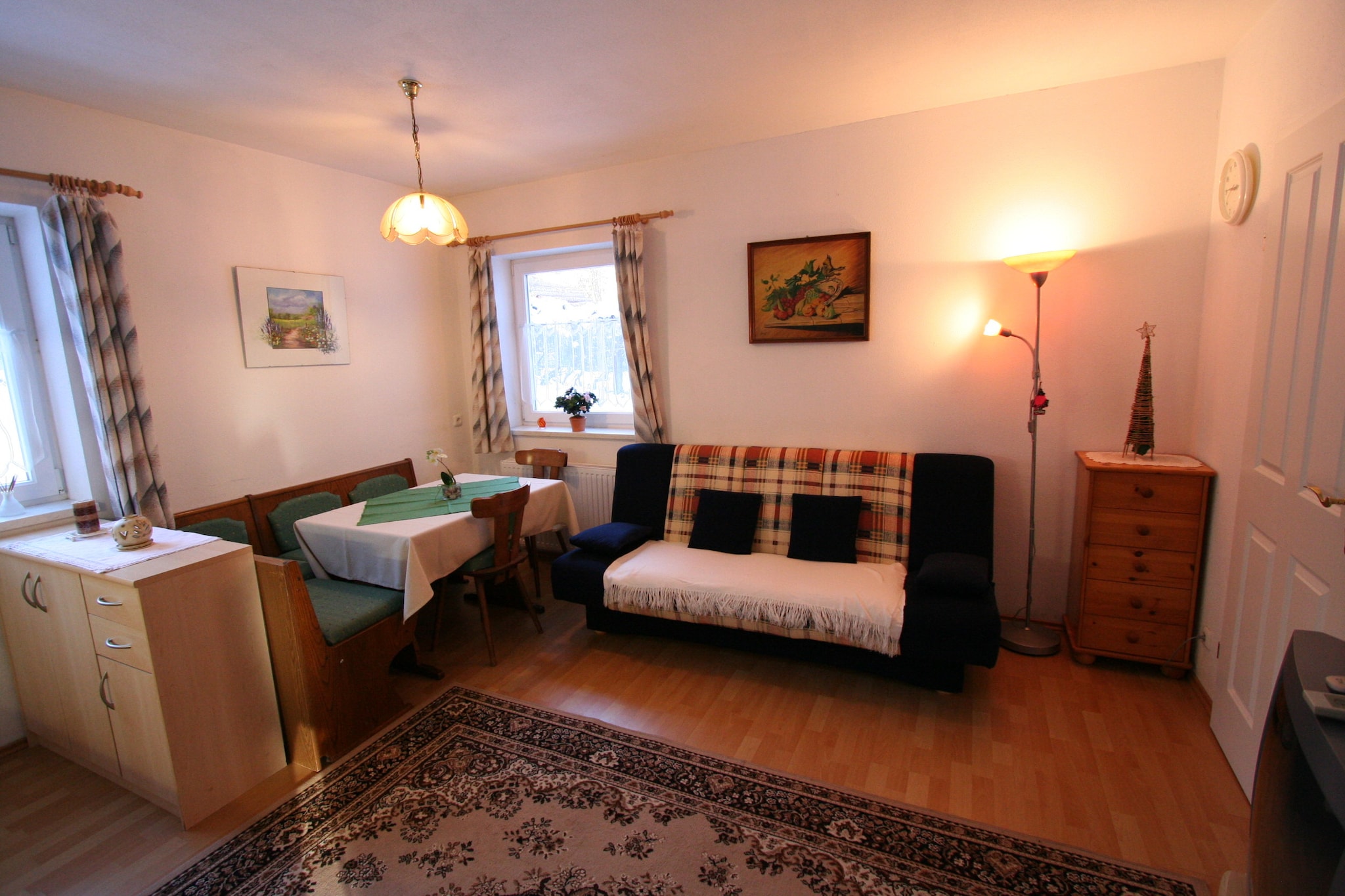 Ground floor: (hall, Living room(TV, seating area), open kitchen(hob, toaster, coffee machine, oven), bedroom(double bed), bedroom(double bed), bathroom(shower, washbasin, toilet))\n\nstove, microwave, ski boot heaters, terrace, garden furniture, parking