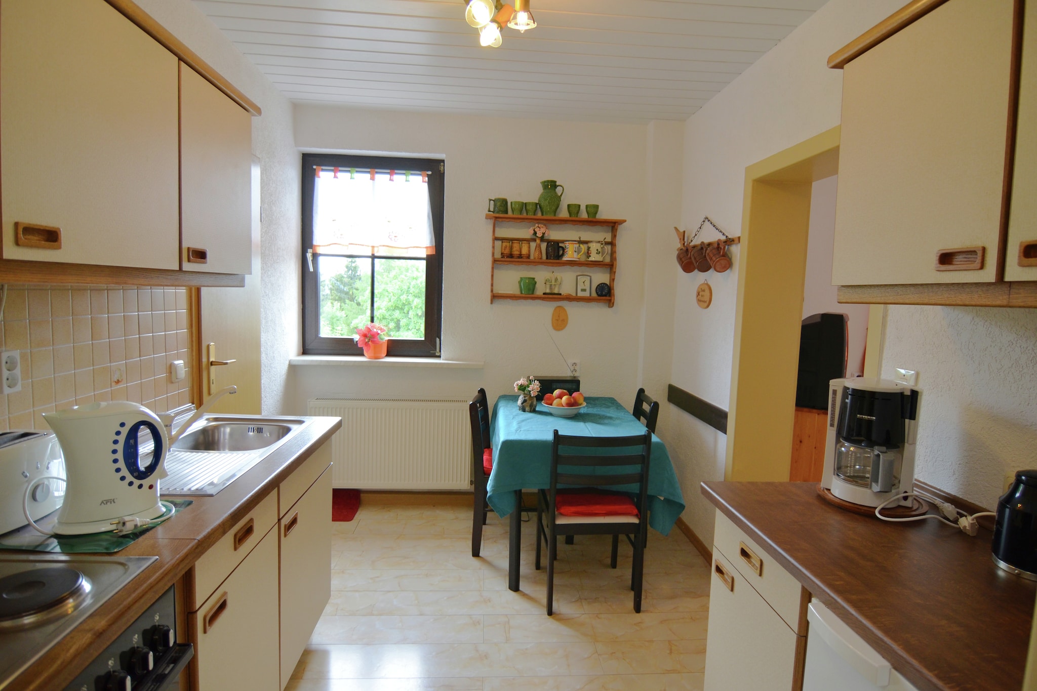 Forestside Retreat
This charming 1-bedroom apartment in Frauenwald offers a cozy escape for 2 guests. Nestled at the edge of lush, dense woods, the apartment provides privacy and a calm atmosphere, ideal for couples seeking a serene getaway. The well-equipped kitchen, comfortable living space, and intimate bedroom create a warm, inviting stay.

Nature & Adventure
Step outside to enjoy peaceful walks, invigorating hikes, or simply breathe in the fresh forest air just 200 meters from your door. Nearby cross-country trails and a public pool (1 km) make it easy to combine relaxation with active adventures. Popular local sights include the Rennsteiggarten, Besucherbergwerk Bergbaumuseum, and the scenic Saalfelder Feengrotten, offering cultural and natural experiences for day trips.

Garden & Leisure
A private garden with furniture and a barbecue invites you to unwind with a meal or enjoy a quiet morning coffee surrounded by greenery. Parking is conveniently available, and a childrenâ€™s bed ensures small families can also enjoy a visit. From romantic evenings on the terrace to day-long forest excursions, this apartment provides a tranquil base to explore the Thuringian regionâ€™s rich natural and cultural attractions.