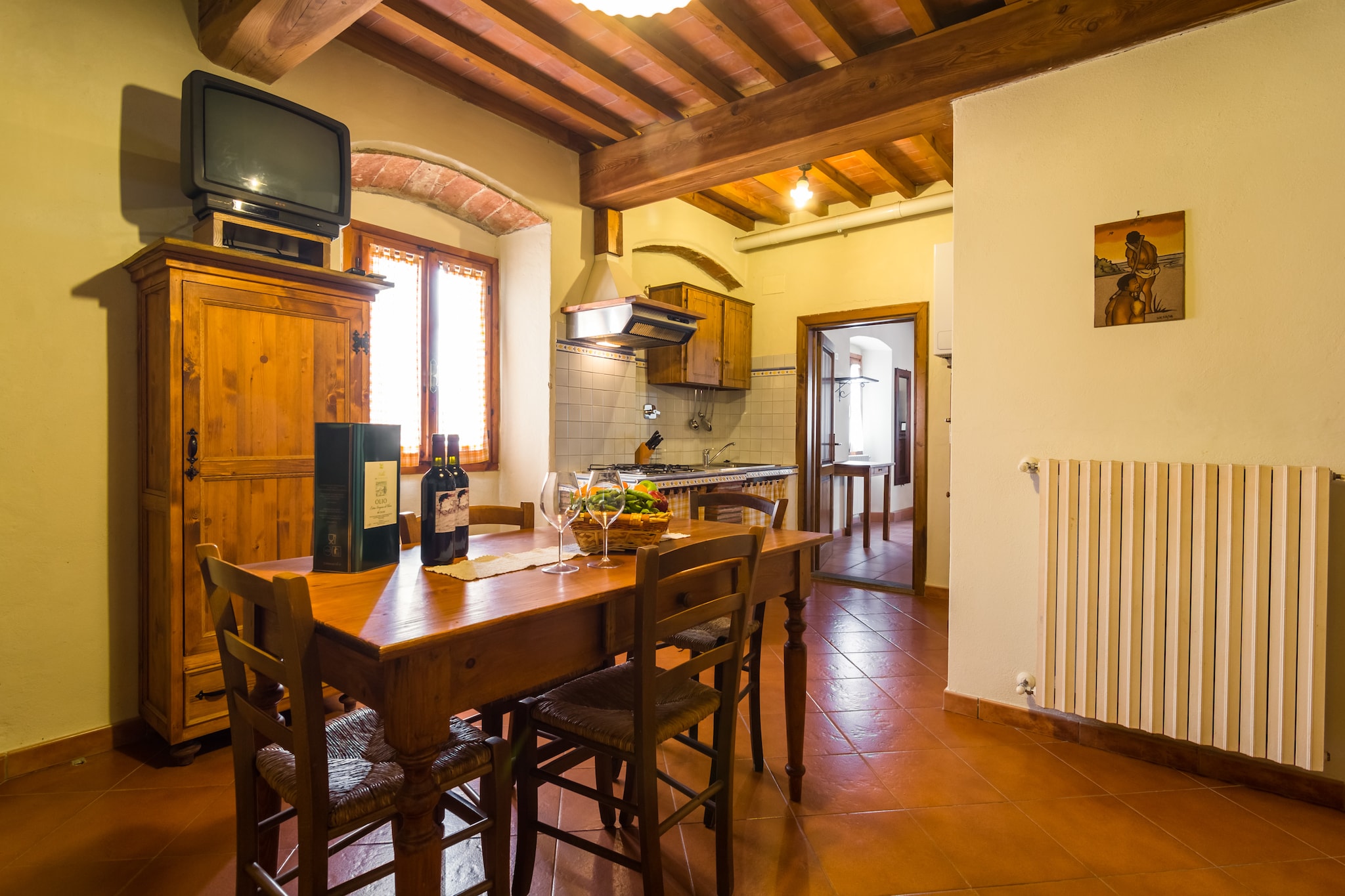 On the 1st floor: (open kitchen, Living/diningroom(TV(satellite), dining table), bedroom(single bed, double bed), bathroom(shower, washbasin, toilet, bidet))\n\nheating, garden(shared with other guests), garden furniture, BBQ, parking, swimming pool(shared with other guests, fenced, opened from Jun upto and including 1/2 Sep), play equipment, table tennis table