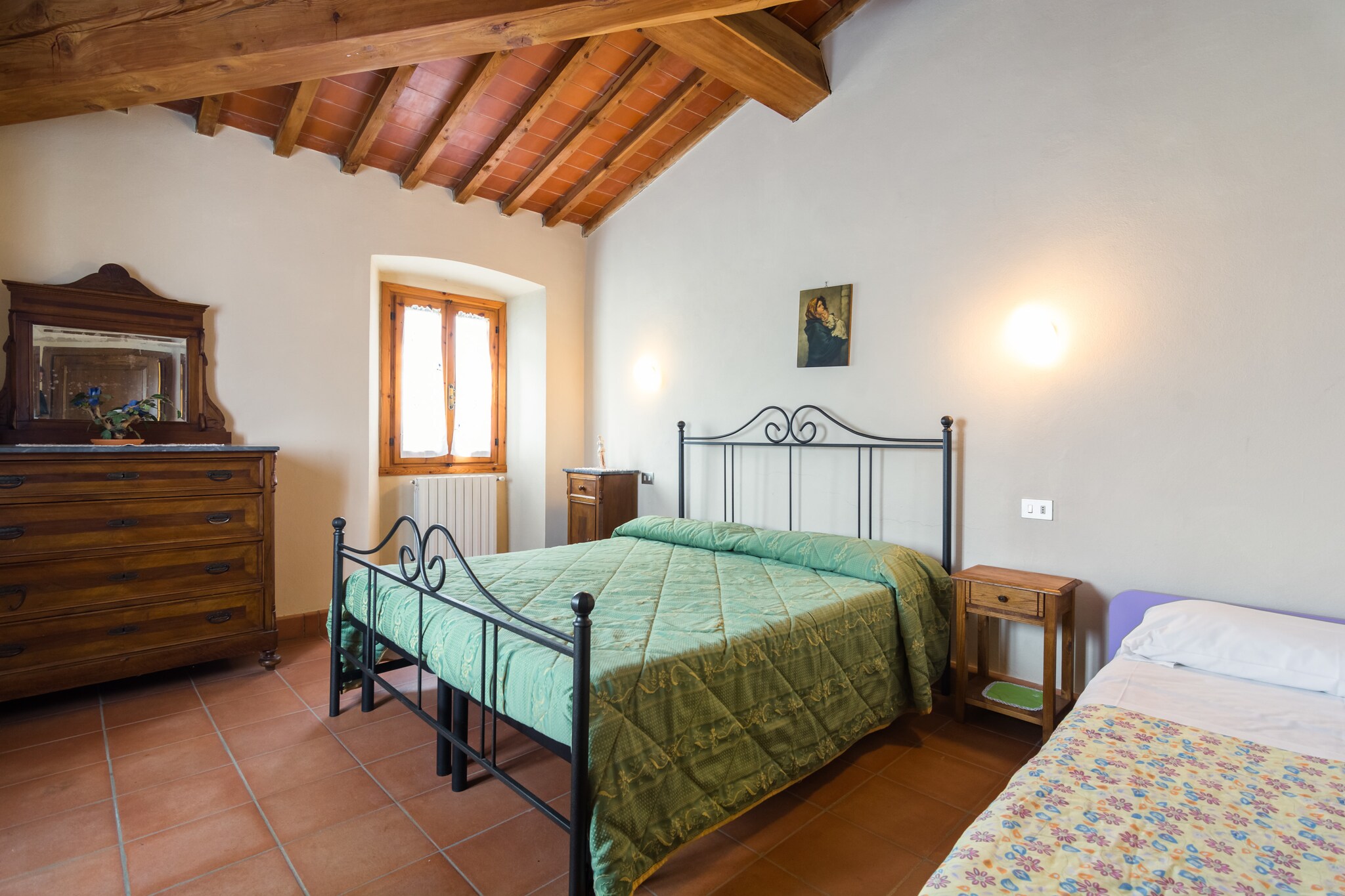 This charming mansion, snug on a scenic Tuscan farm in Pian di ScÃ², offers a tranquil retreat surrounded by forests and rolling mountainsâ€”perfect for nature lovers and hikers. The cozy 1-bedroom apartment comfortably accommodates up to three guests. Shared facilities include a fenced swimming pool open from June to mid-September, a garden with furniture, a barbecue area, and play equipment for children. For some friendly competition, a table tennis table is also available, while parking and WiFi add to the convenience of your stay.

The property is ideally located near several captivating historical sites and natural wonders. History enthusiasts will appreciate visiting the Torre Arnolfo di Cambio in Castelfranco di Sopra, a surviving tower of a medieval castle. Art lovers can explore the Masaccio Reggello museum, which houses remarkable paintings spanning the 15th to 19th centuries. Nature buffs will be drawn to Le Balze, a stunning nature reserve known for its dramatic yellow ocher cliffs and unique geological layers. Nearby, the expansive Reggello forest, covering around 900 hectares, provides excellent hiking trails amidst Tuscanyâ€™s lush landscape. Additionally, the area boasts several majestic castles including Castello di Torre, Castello di Leccio, and the enchanting Castello di Sammezzano.

For your daily needs, the town center lies just 1 km away, offering shops and general supplies. Public transport and tourist information can be accessed about 5 km from the property, making it easy to explore the surrounding Tuscan region.